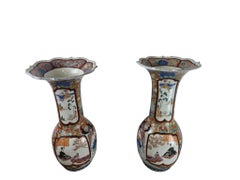 Pair of Monumental Meiji Period Japanese Porcelain Vases with Carved Consoles