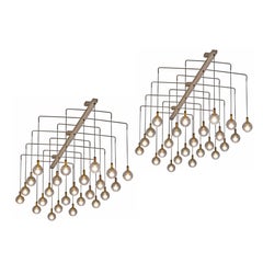 Pair of Monumental Mid Century Chandeliers in Glass, Metal and Patinated Brass