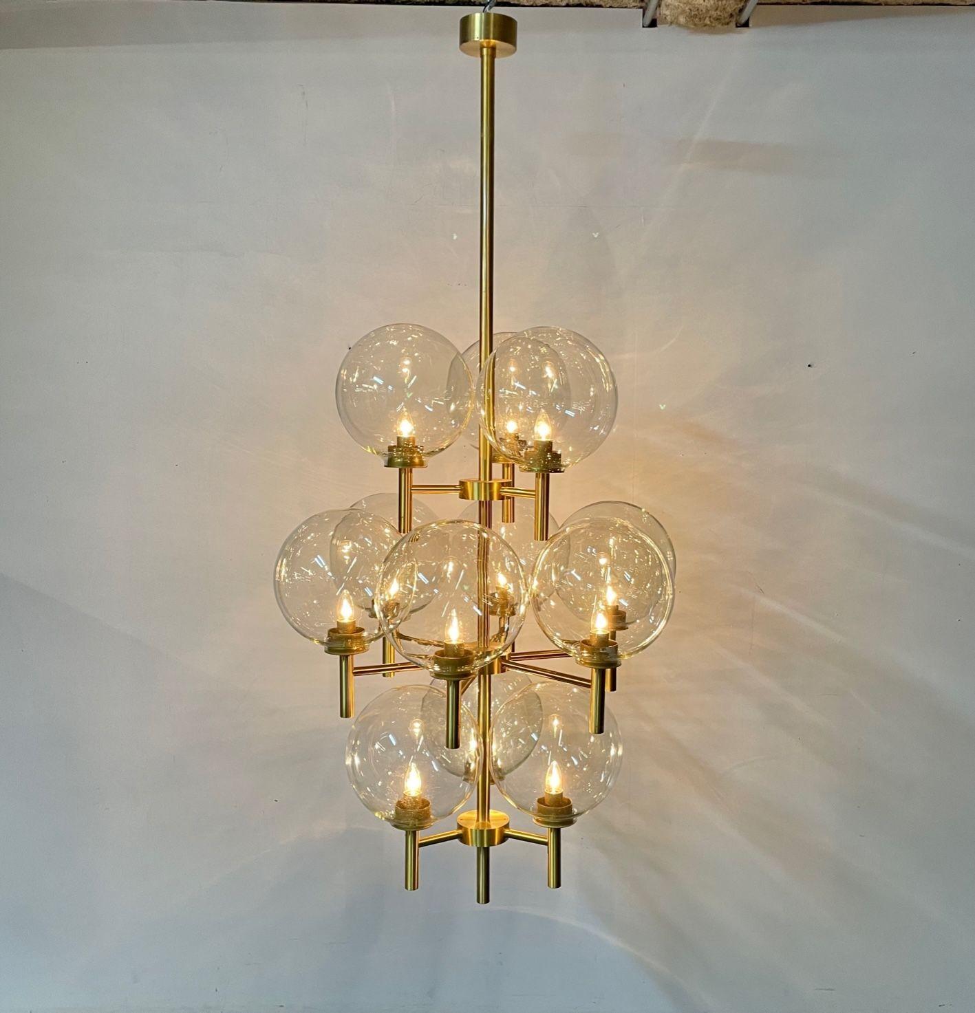 Contemporary Pair of Monumental Mid-Century Modern Style Chandeliers in Amber Glass and Brass For Sale