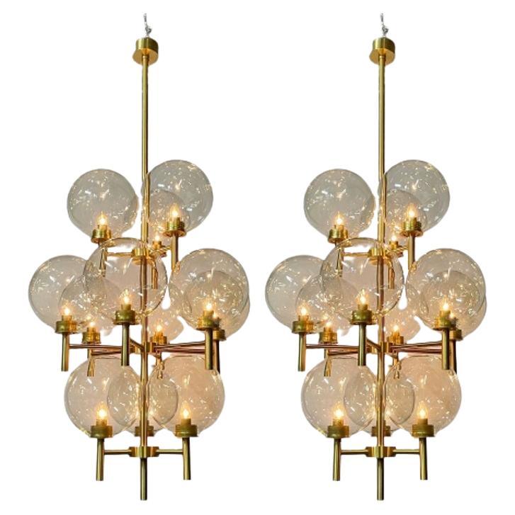 Pair of Monumental Mid-Century Modern Style Chandeliers in Amber Glass and Brass For Sale