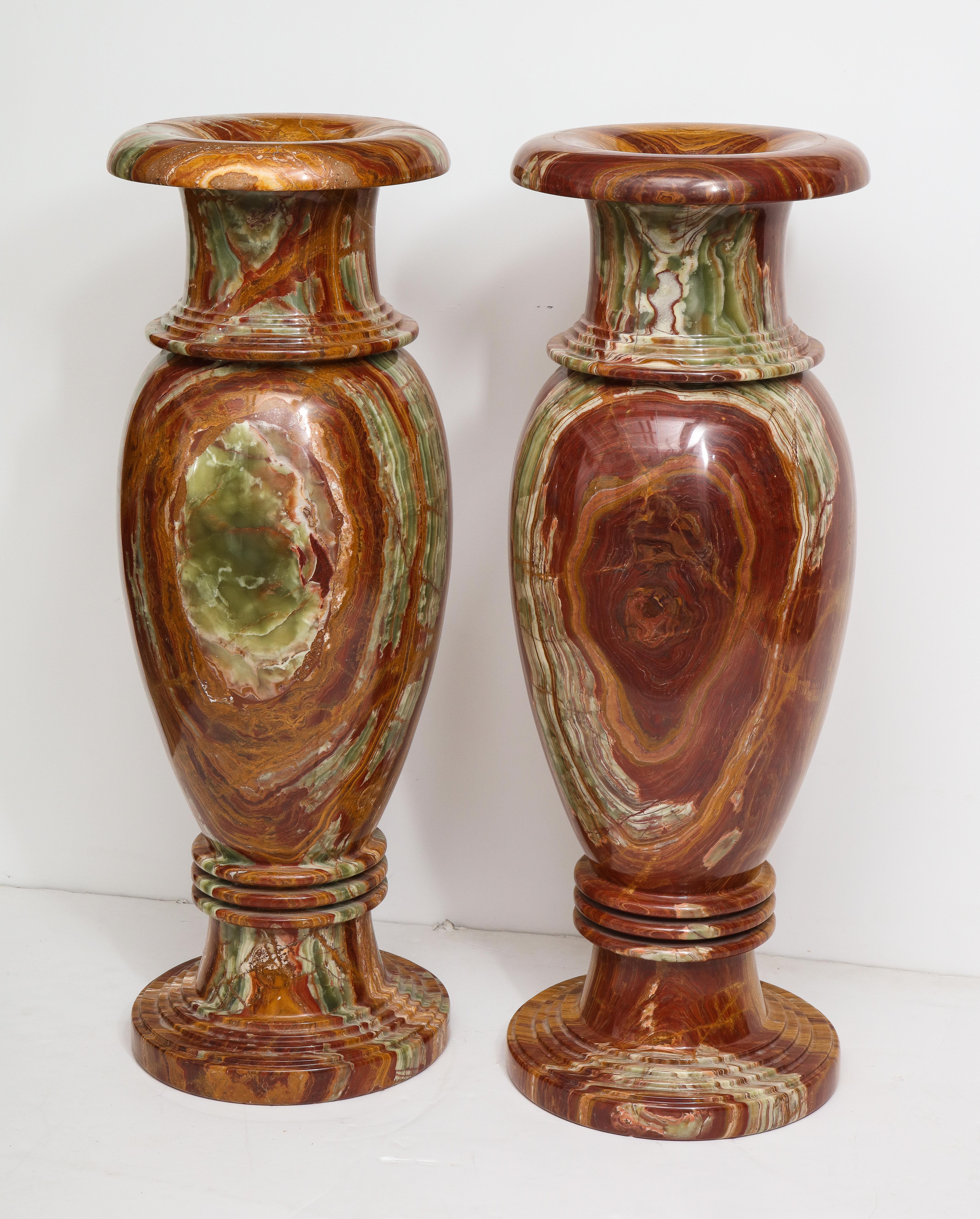 Neoclassical Pair of Monumental Onyx Urns