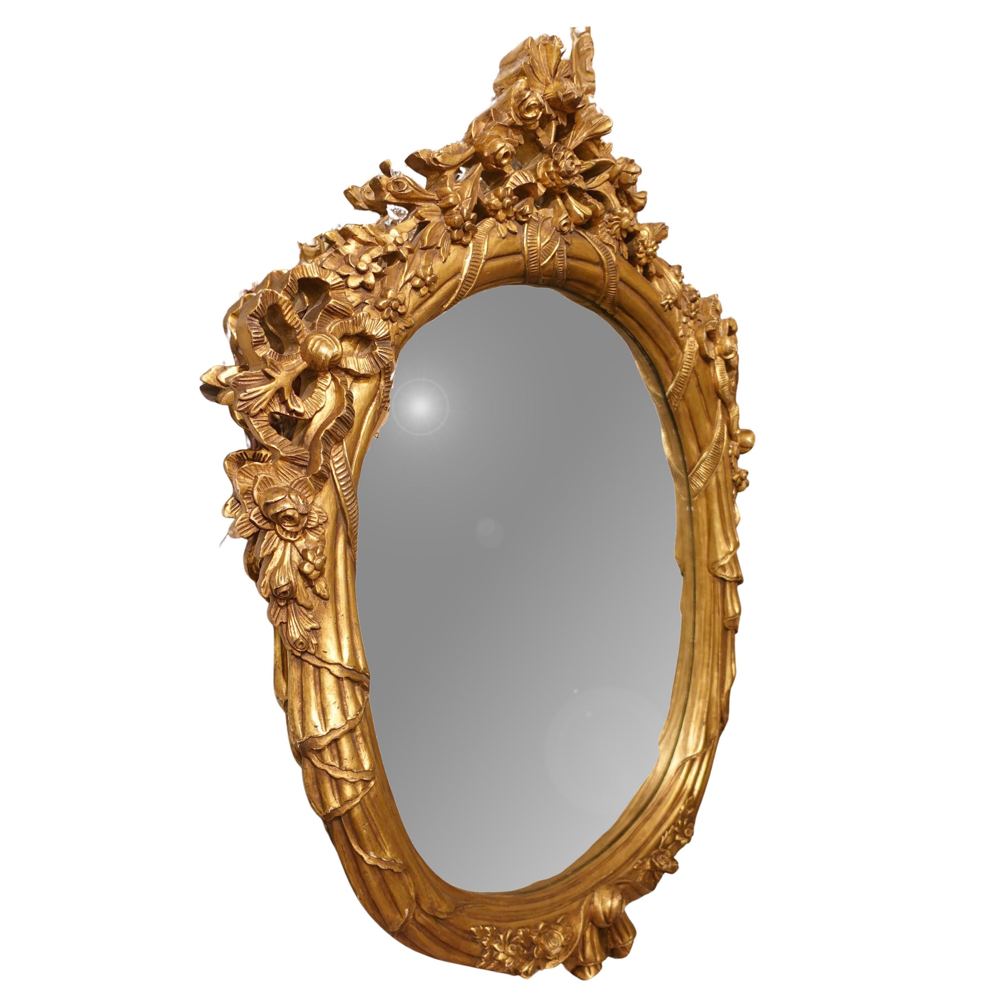 Français Pair of Monumental Oval Louis XV Style Mirrors en vente