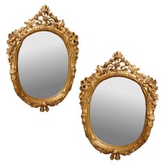 Pair of Monumental Oval Louis XV Style Mirrors
