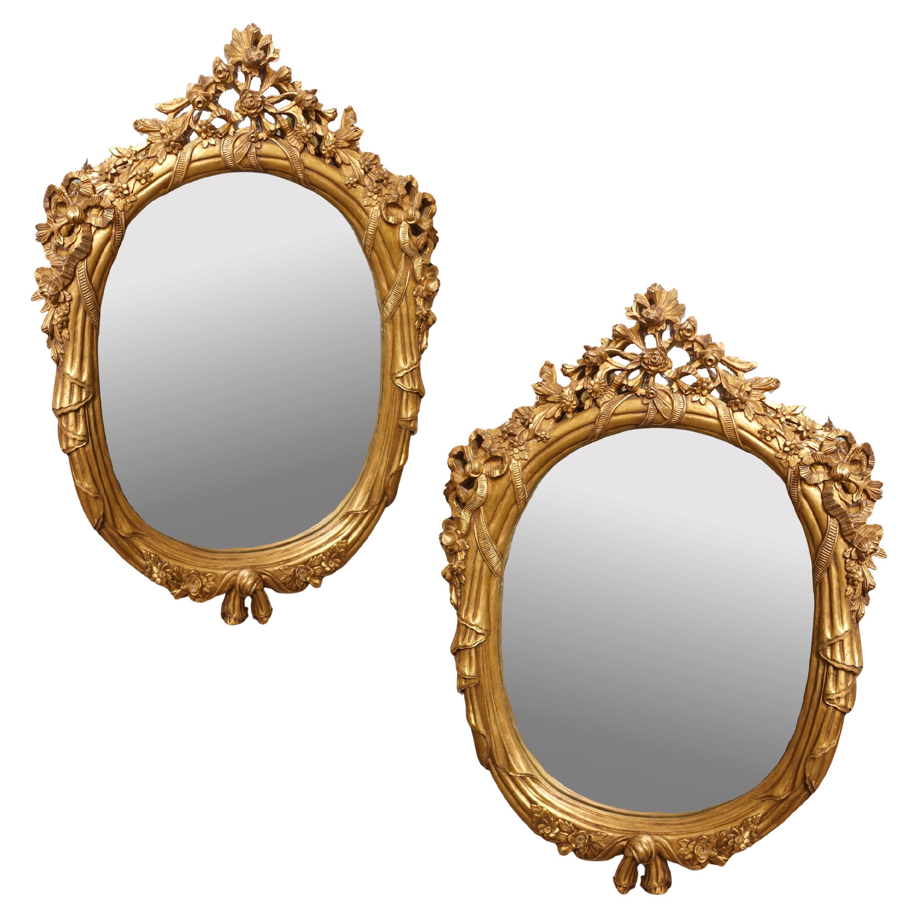 Pair of Monumental Oval Louis XV Style Mirrors