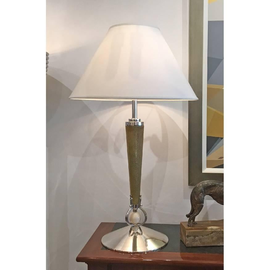 A pair of stunning Art Deco table lamps by Atelier Petitot made of silver-plated bronze with a galuchat (shagreen) shaft.
Signed: Petitot Paris
Made in France, 
circa 1930.