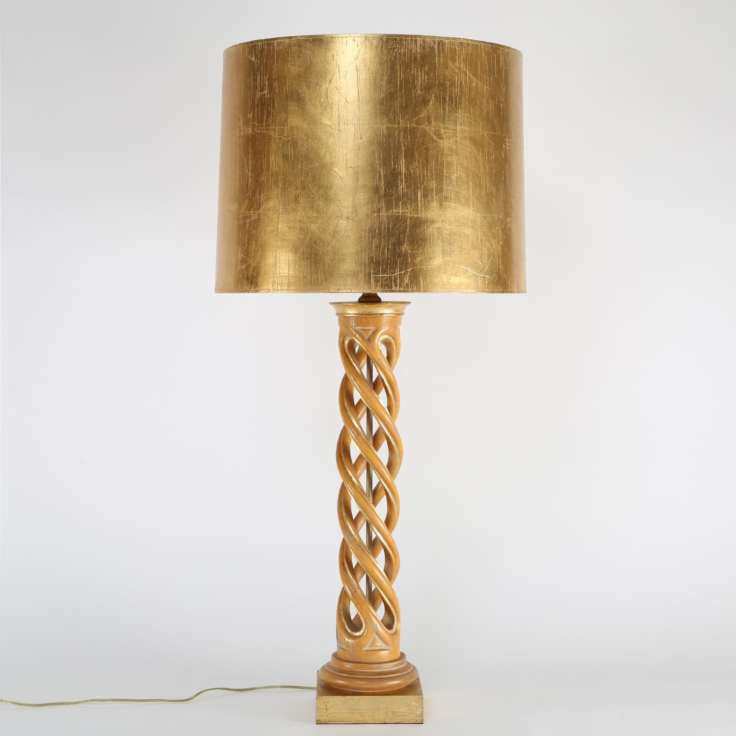 Pair of monumental carved helix table lamps in bleached mahogany with gilt bases and shades by Frederick Cooper, American, 1950's. These sculptural table lamps are beautifully made.

Measures: Shade diameter: 20 inches
Shade height 15 inches.