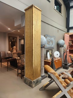 Pair of Monumental Three-Sided Giltwood Fluted Columns with Faux-Marble Bases