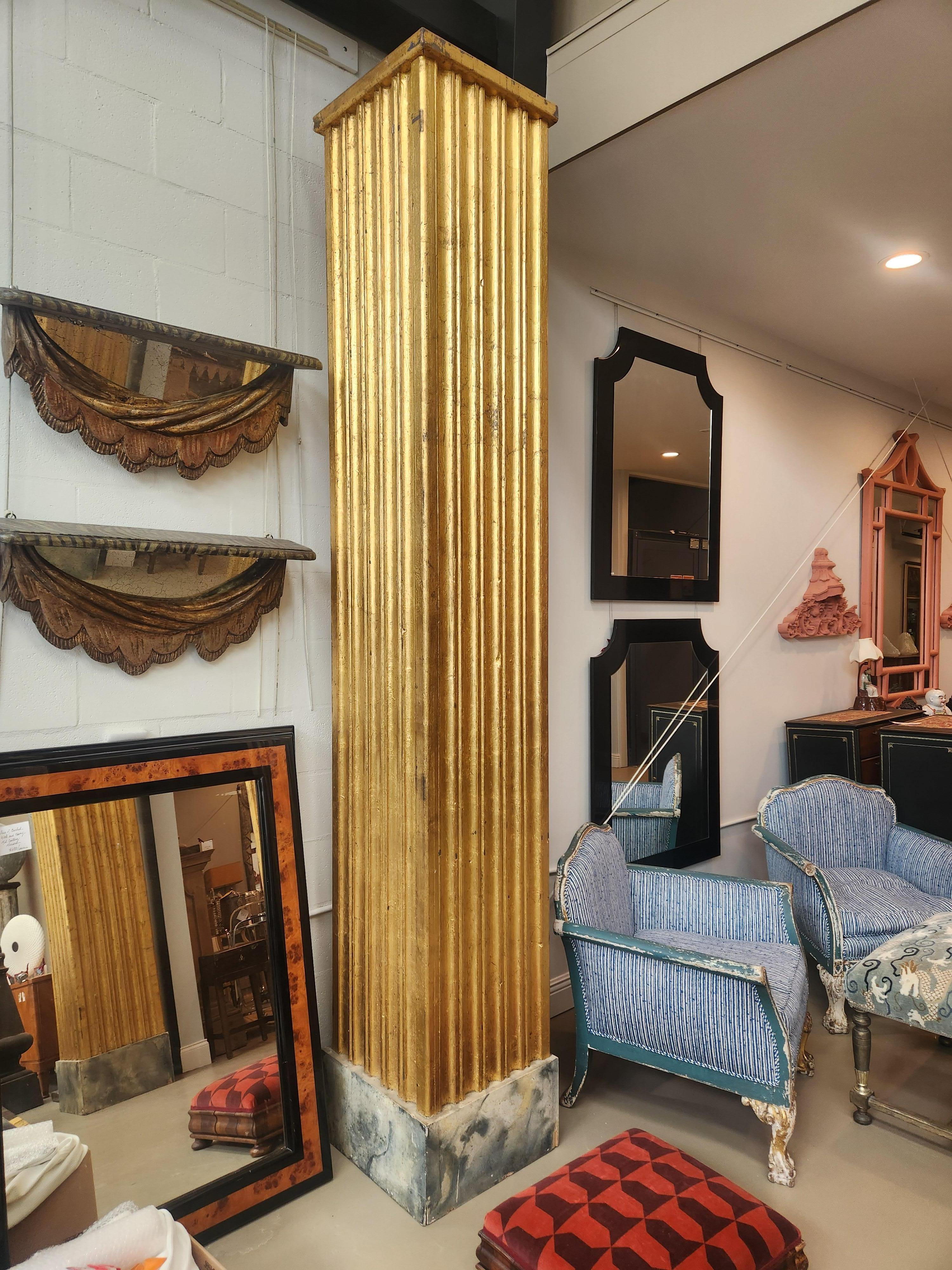 Neoclassical Revival Pair of Monumental Three-Sided Giltwood Fluted Columns with Faux-Marble Bases For Sale