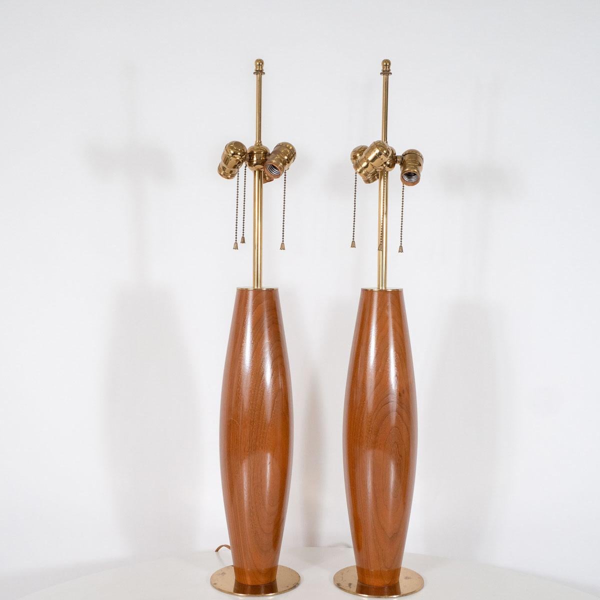 Pair of walnut table lamps with brass hardware by Stewart Ross James for Hansen.