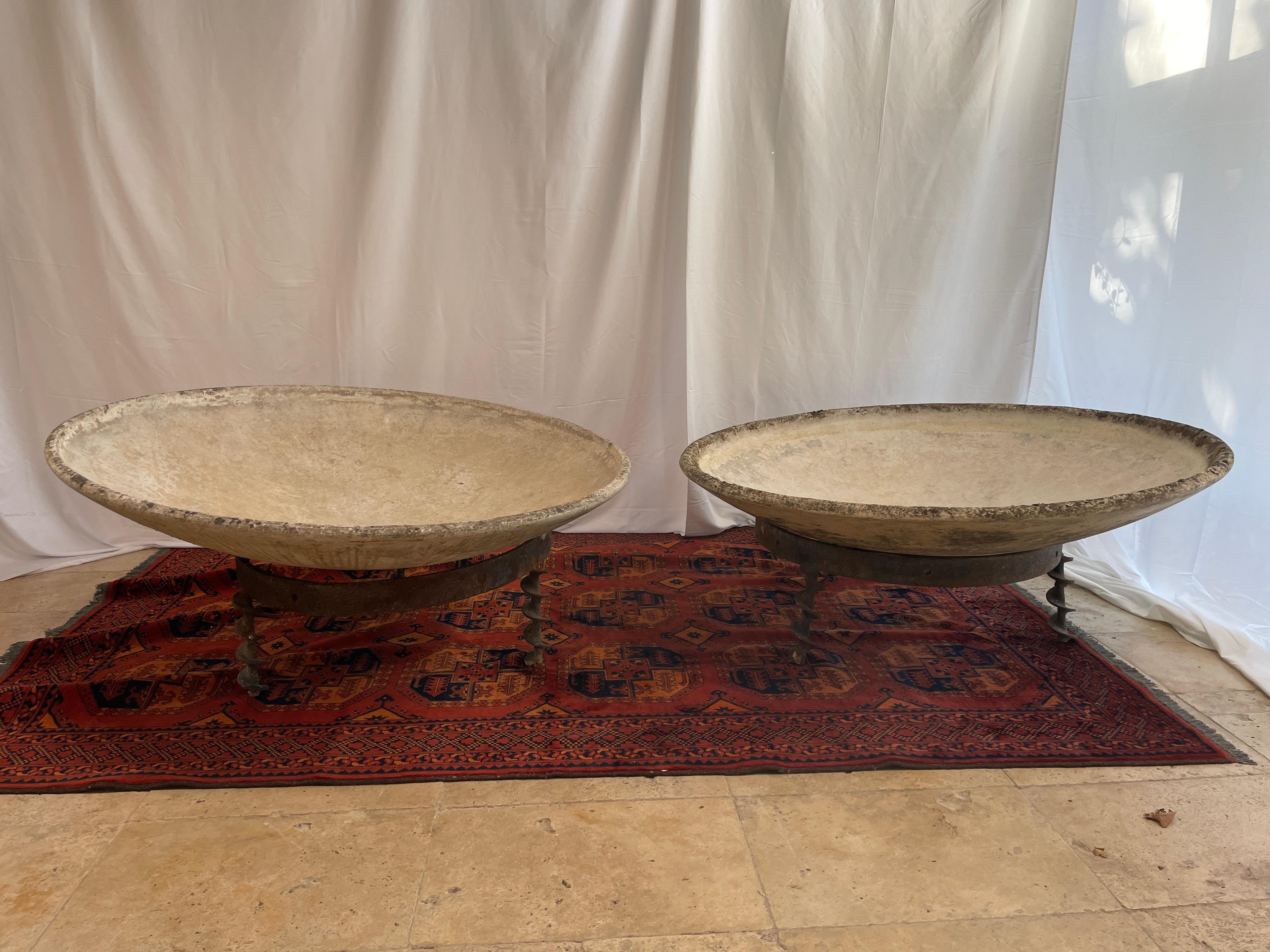 Pair of Monumental bowl planters with steel stand by Willy Guhl 59' inch , I have more of them , soon here 
After they stopped manufacturing, many people threw their Willy Guhl's in the garbage. 
Each piece by the use of time and by their former