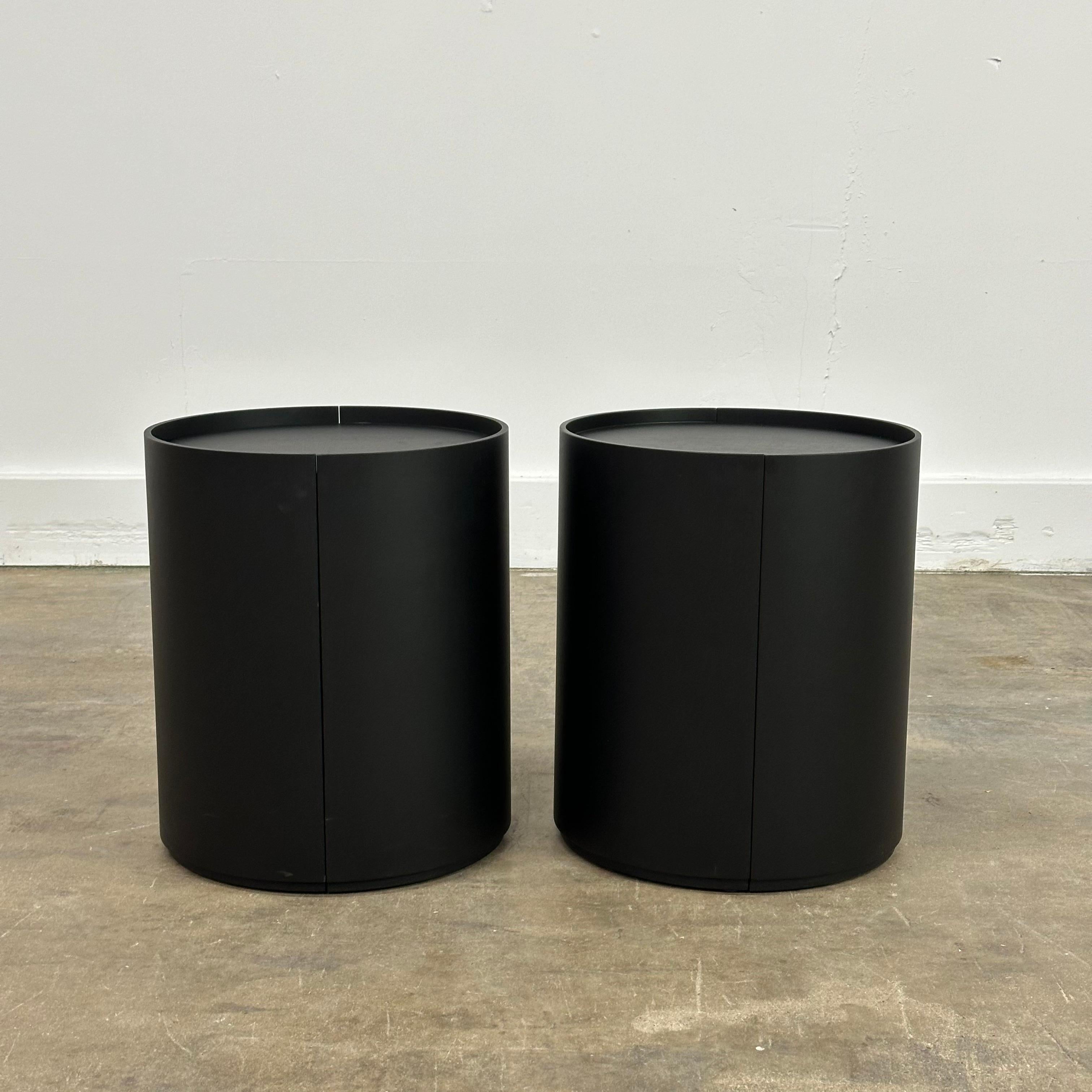 Pair of Moon Bedside Tables by Mist-O for Living Divani. Moon is composed of two semi-cylinders that reveal its internal surfaces when opened. The two portions are hinged together, and magnets inside the structural frame ensure sturdy closure