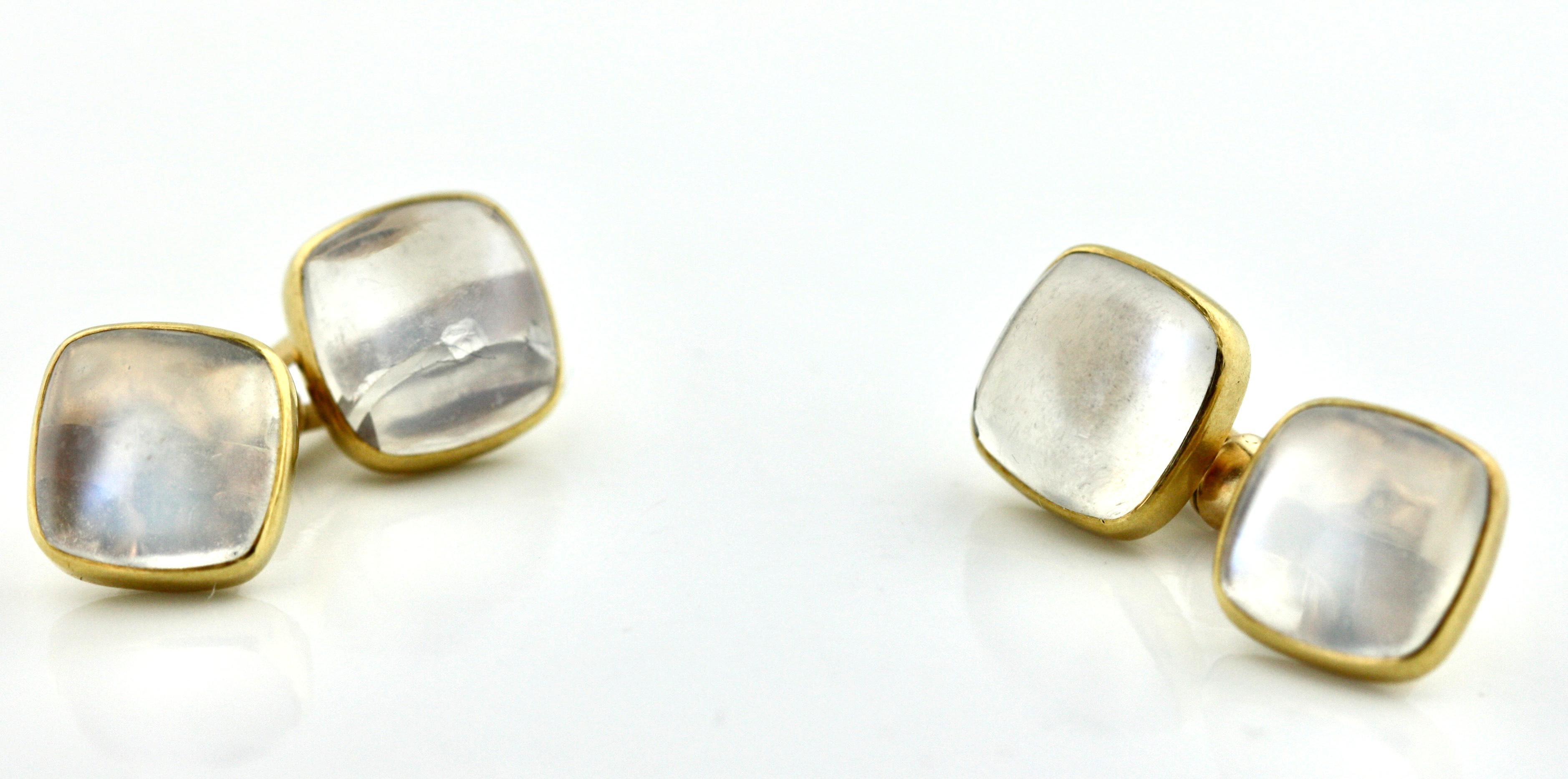 
Pair of Moon Stone Cufflinks
Featuring four sugarloaf cabochon moonstones, within frames of gold.
Cufflink head dimensions 10 x 10x 4.6 mm
14 karat gold