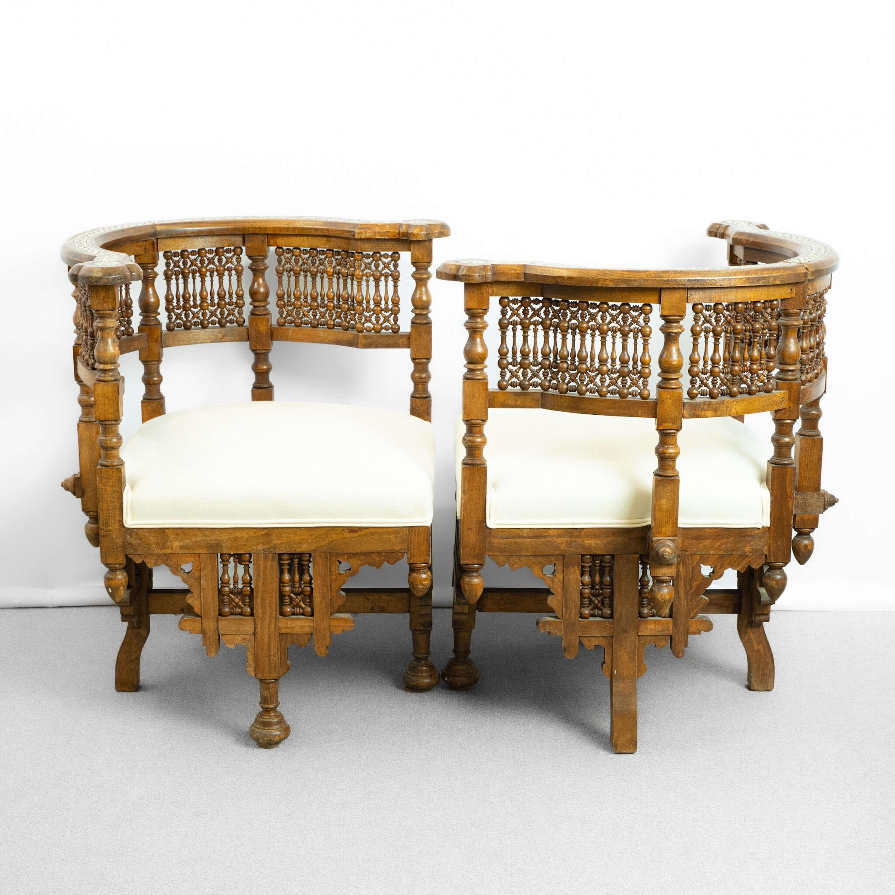 Pair of Moorish Inlaid Chairs.
Recently upholstered in double piped calico fabric.
We can help with other upholstery if required 
With mashrabiya frame detail.

Back Height - 73cm
Seat Height - 45cm
Width - 70cm
Depth - 68cm

Africa, circa