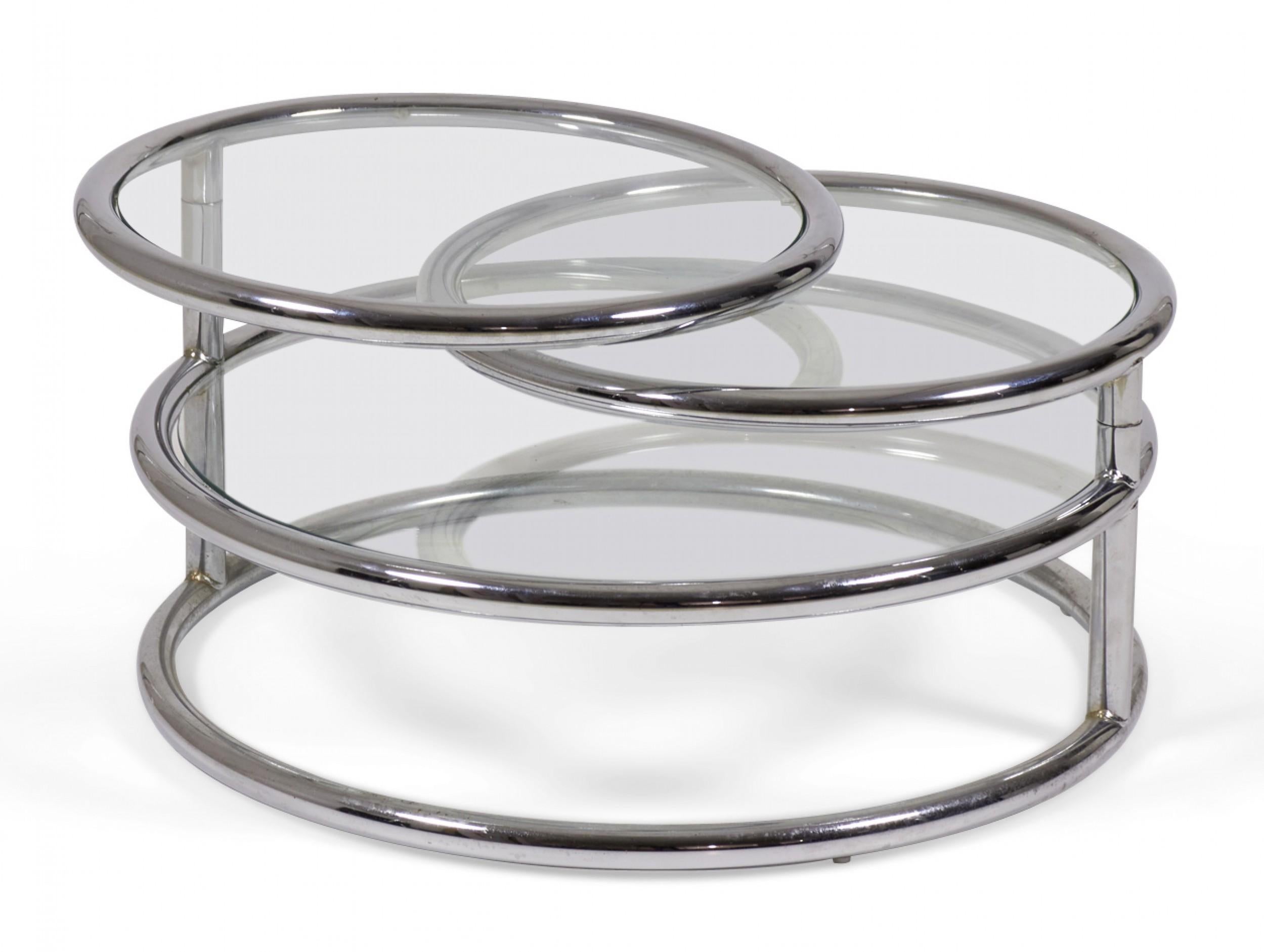 Pair of Italian Mid-Century Space Age-style (circa 1970) articulating 'Convertible' circular cocktail / coffee table with a chrome tube frame with four circular glass tabletops, the top two of which articulate on two vertical chrome supports.
