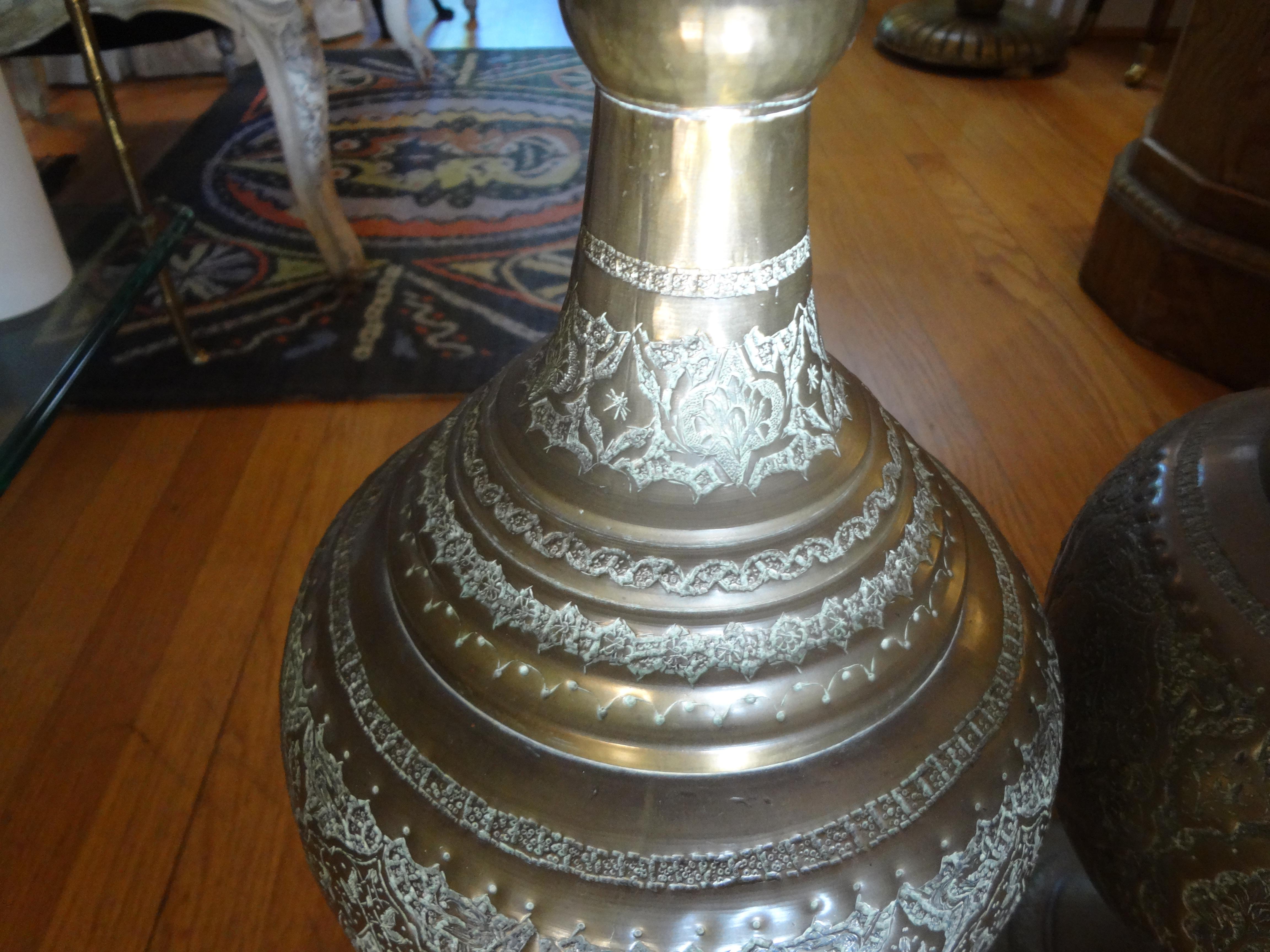 Mid-20th Century Pair of Moroccan Arabesque Style Incised Brass Lamps