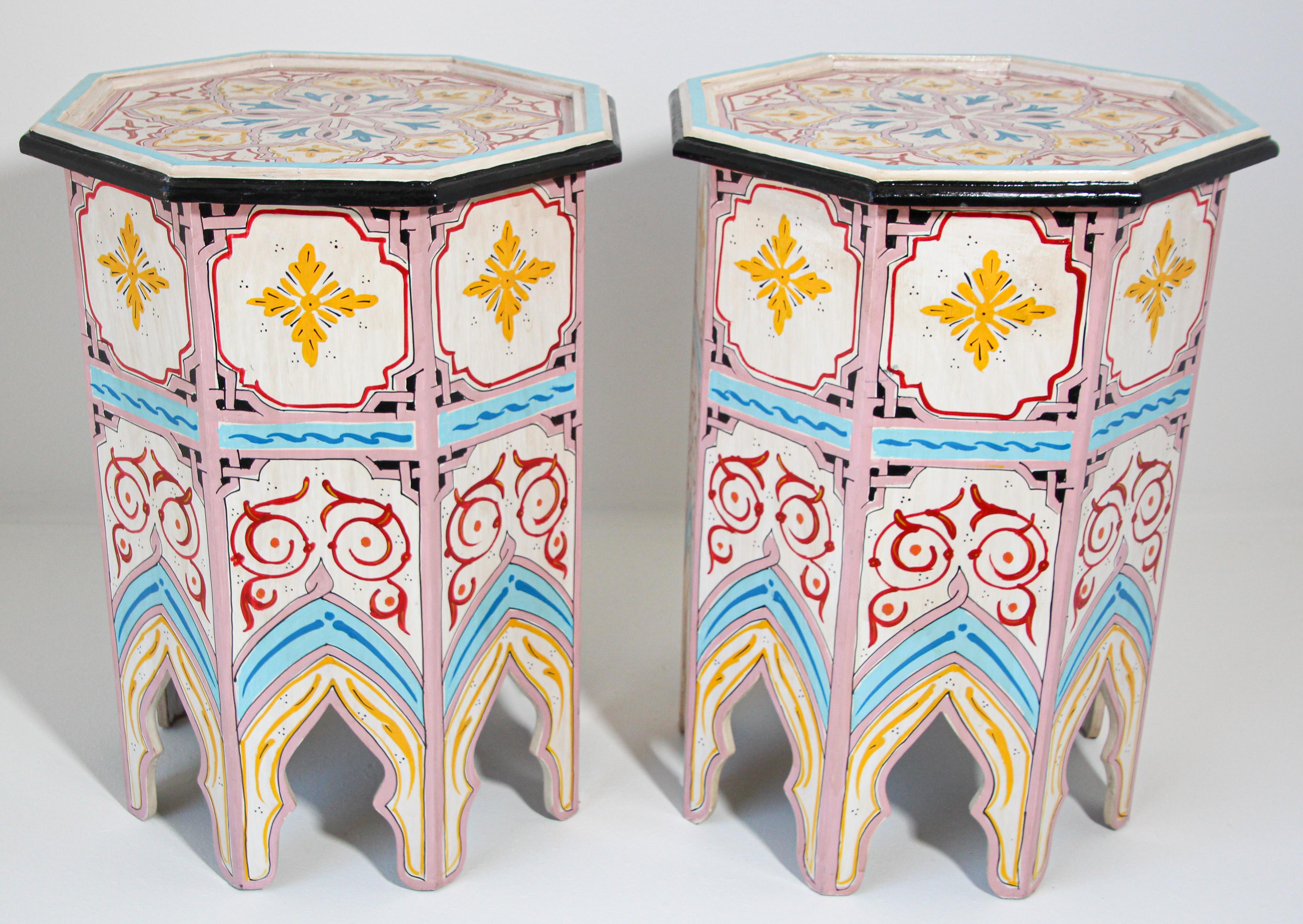 Pair of Moroccan handcrafted and ivory color hand painted tabourets or side tables.
Octagonal shape pedestal tables with Moorish arches.
Very decorative fine artwork in octagonal shape base.
You can use them as nightstand, stools, or side