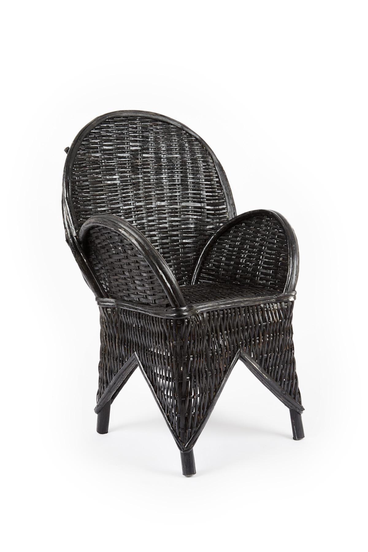 Pair of wicker chairs handmade in Morocco with natural wicker and painted in black. Uniquely crafted in Morocco, these chairs have a uniquely sculptural design and a solid structure offering a comfortable seat.
Additional colors available upon