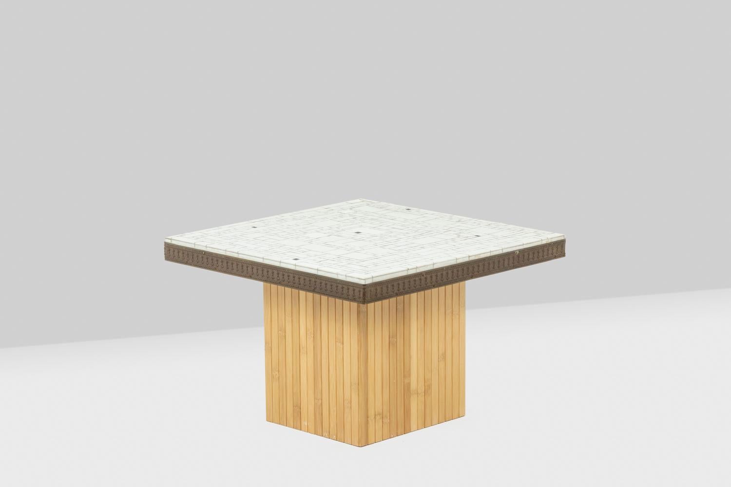 Pair of side tables. Trays in mosaics, square in shape resting on a ribbed base, in wood and in square shape.

German work realized in the 1970s.