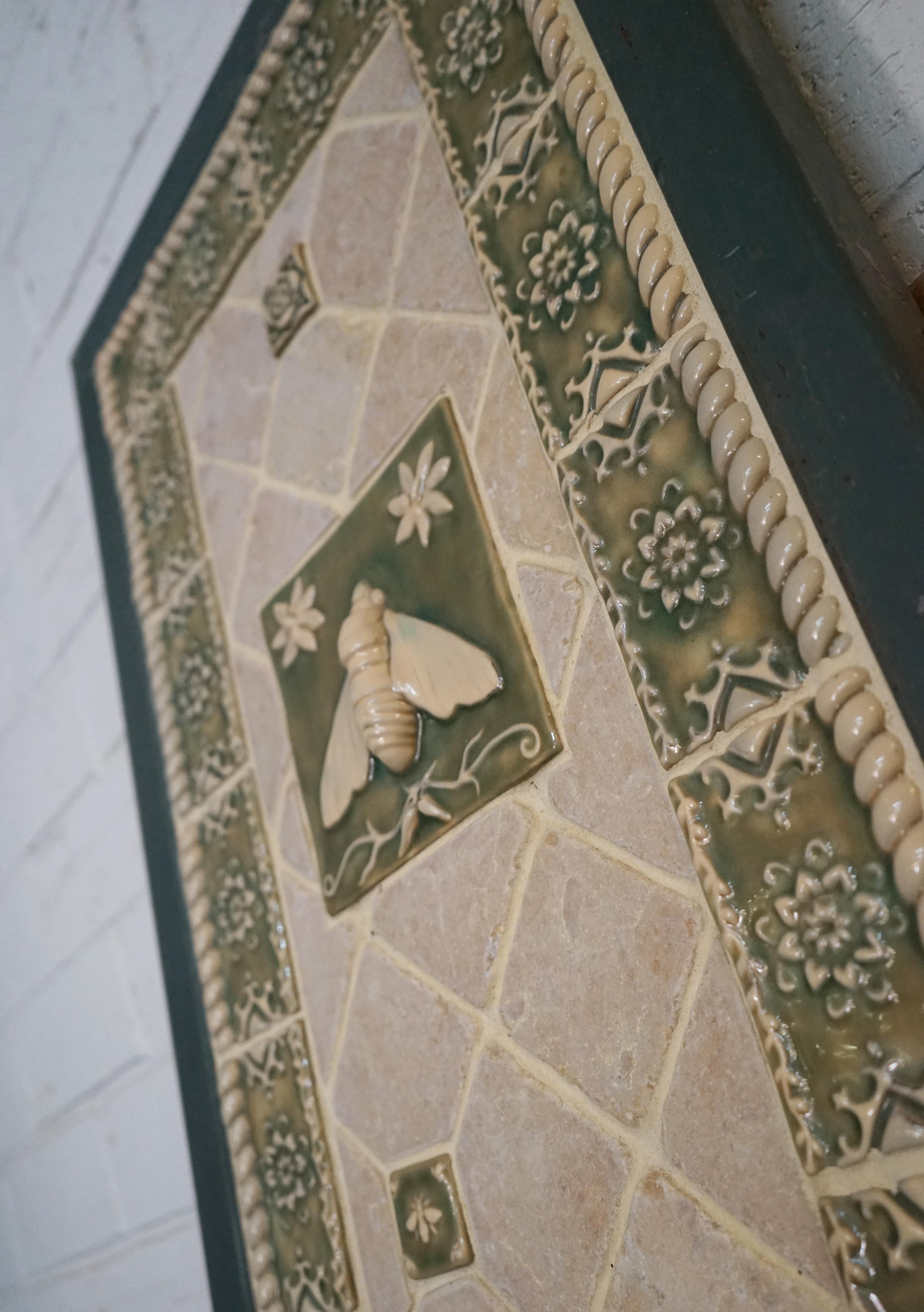 This pair of panel doors are perfect for a garden or outdoor divider. Dark green iron frame and back, with a tile and mosaic pattern on the front side, depicting bumble bees and floral motifs. Contemporary.

Measurements: Each panel is 23'' W x