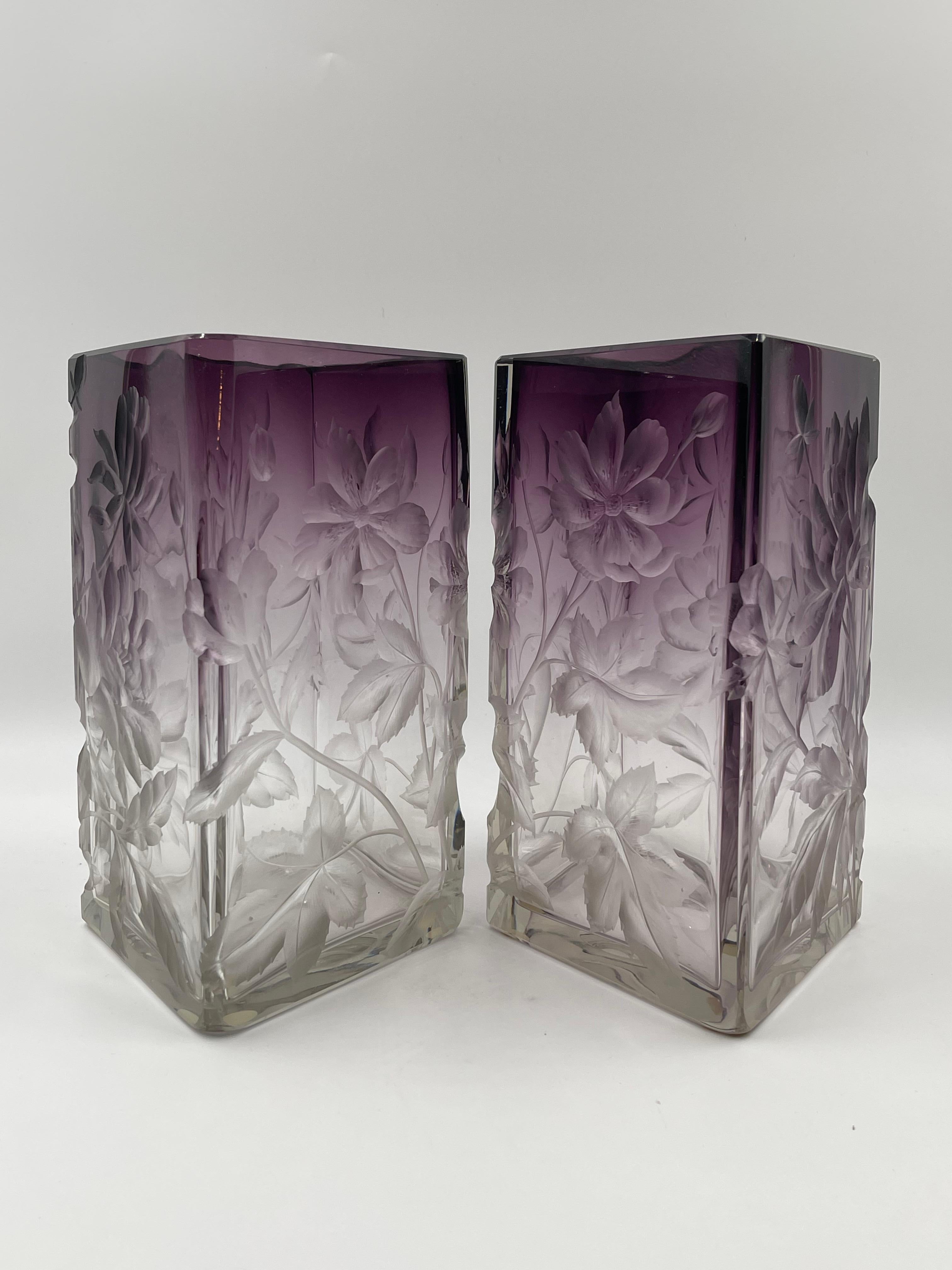 A very fine unusual pair of carved intaglio Moser vases. They are in a rare Diamond shape and would look great on a mantle or sideboard.