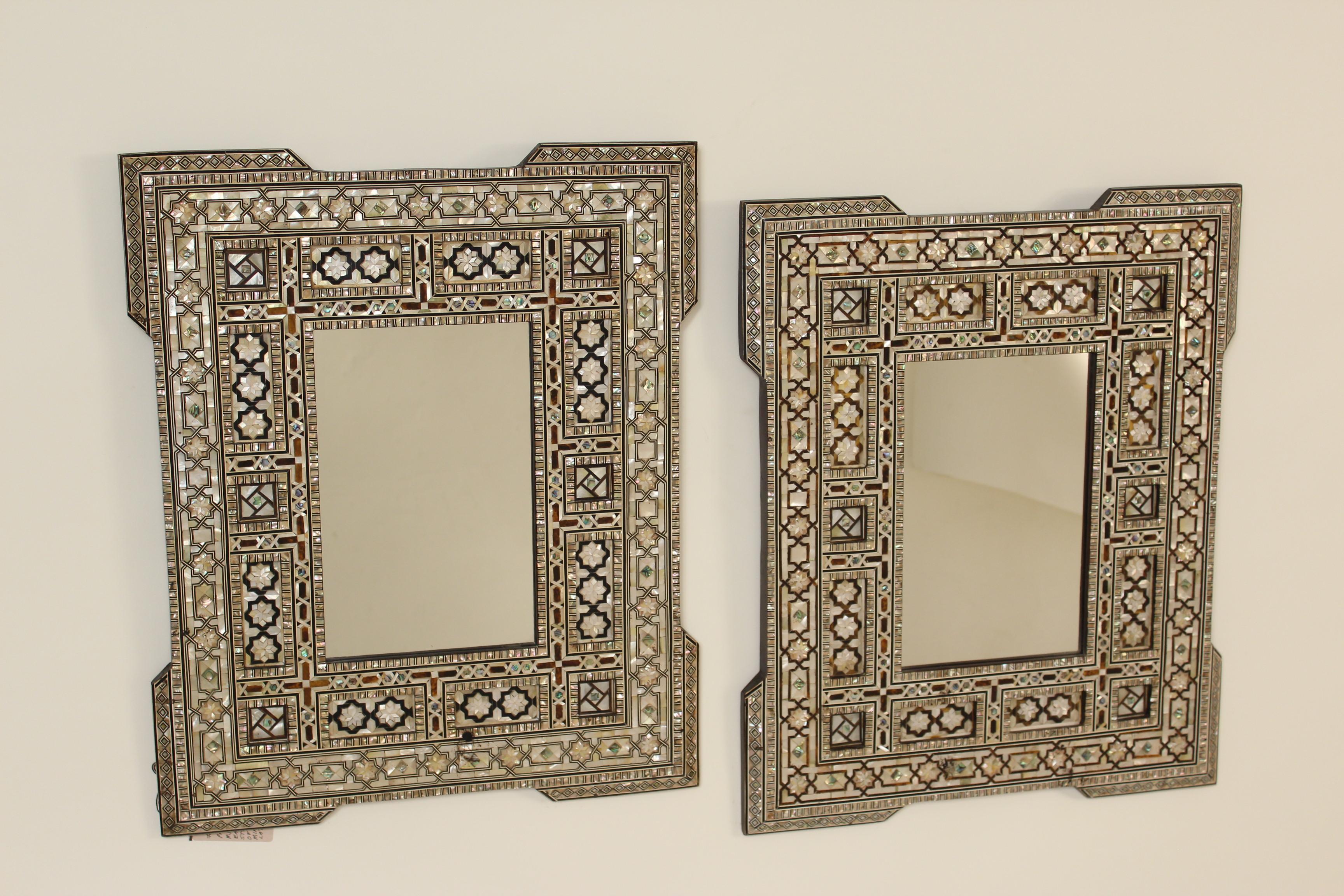 Pair of mother-of-pearl inlaid Middle Eastern mirrors, late 20th century.
