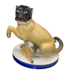 Pair of Mottahedeh Pug Dog Figures, Staffordshire Style, Mid-20th Century.