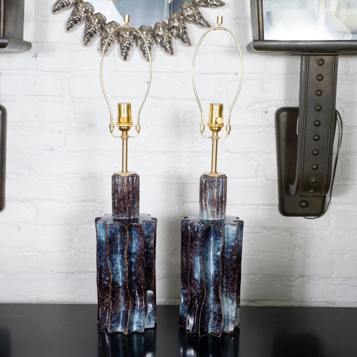 Pair of ceramic lamps with blue and brown mottled finish.
