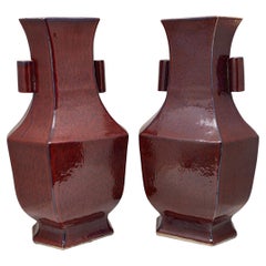 Pair of Mottled Oxblood Hu Vases