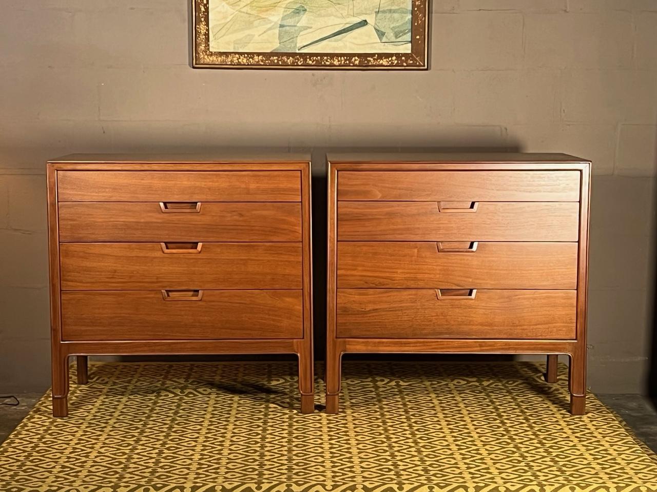A pair of classic walnut dressers by John Stuart from the 
