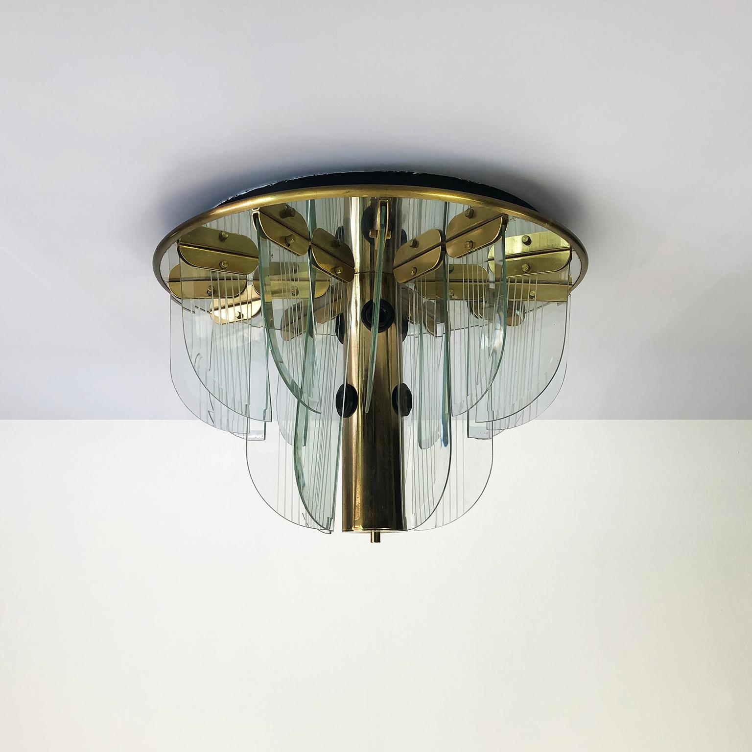 Circa 1970. We offer this pair of mount ceiling Lights attributed to Lightolier.