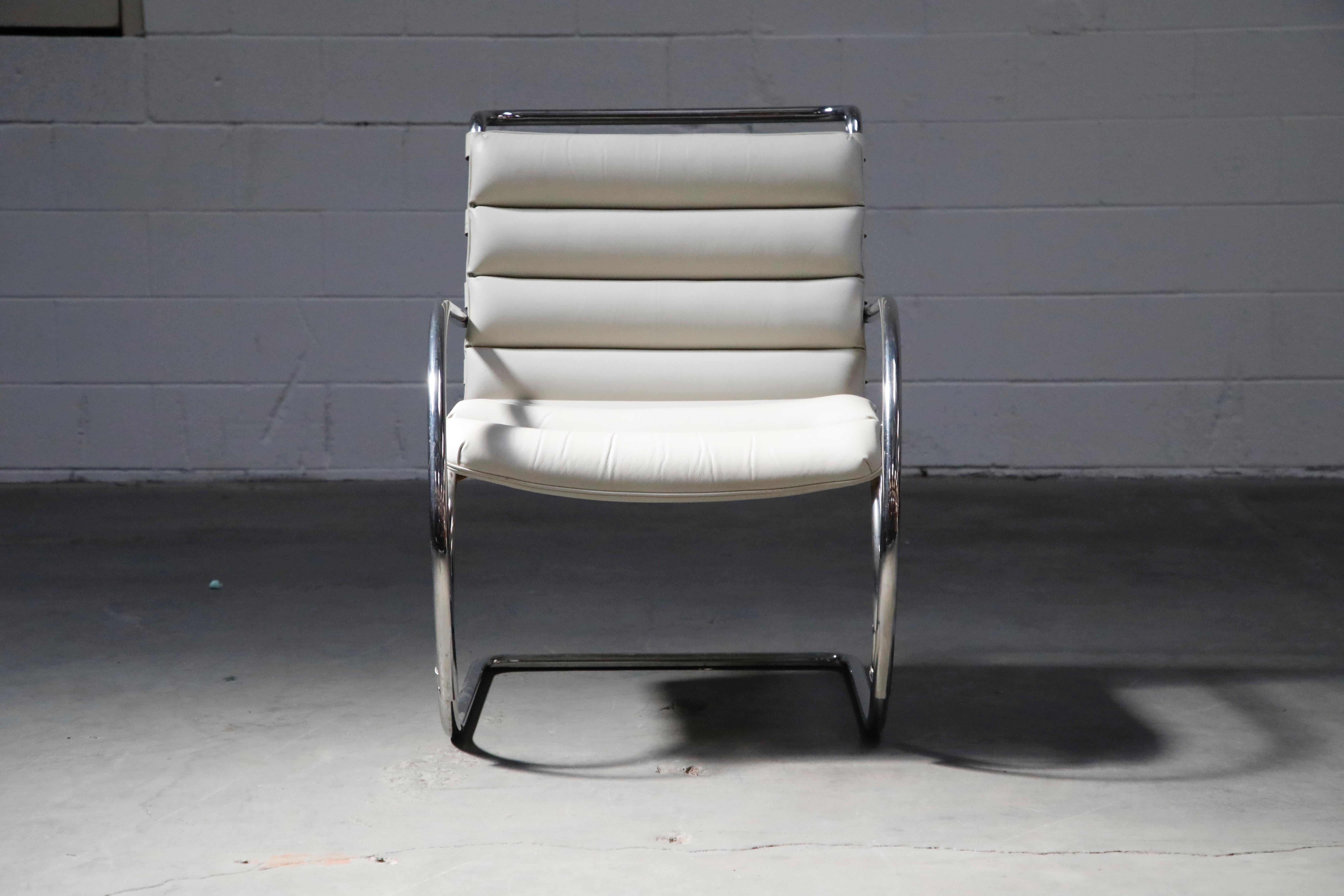 An incredible pair of signed MR armchairs by Ludwig Mies van der Rohe for Knoll Studio, both pairs are stamped Knoll Studio with Mies van der Rohe's signature to the frames. The very-light-grey leather, which looks almost-white in some light
