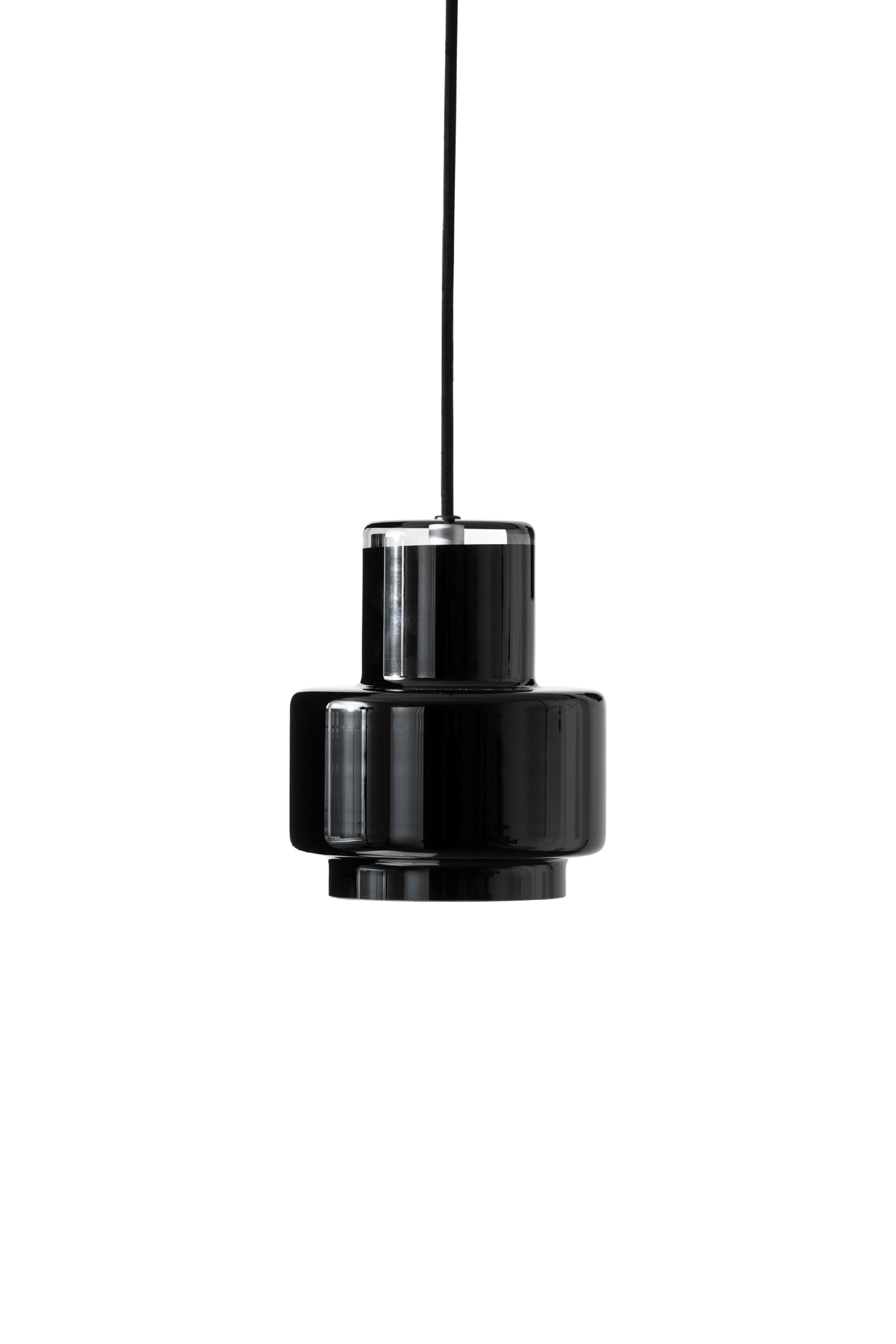 Pair of 'Multi S' Glass Pendants in Black by Jokinen and Konu for Innolux. Executed in hand blown black glass. 

The award winning Multi glass collection is based on an artistically innovative form of modular glass blowing mold developed by the