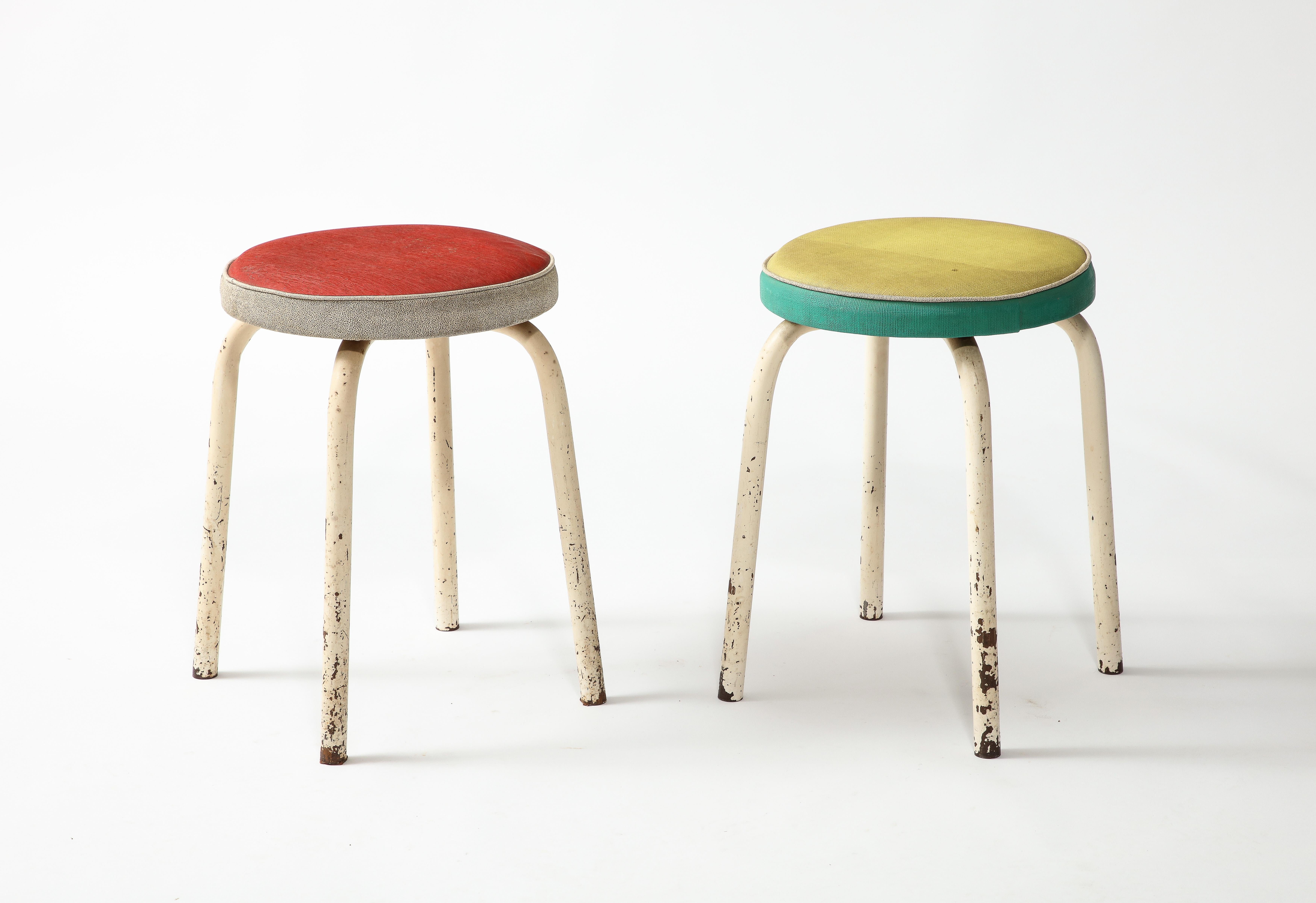Pair of multicolored stools in original upholstery and patina, reminiscent of the bright colored works of Mategot.