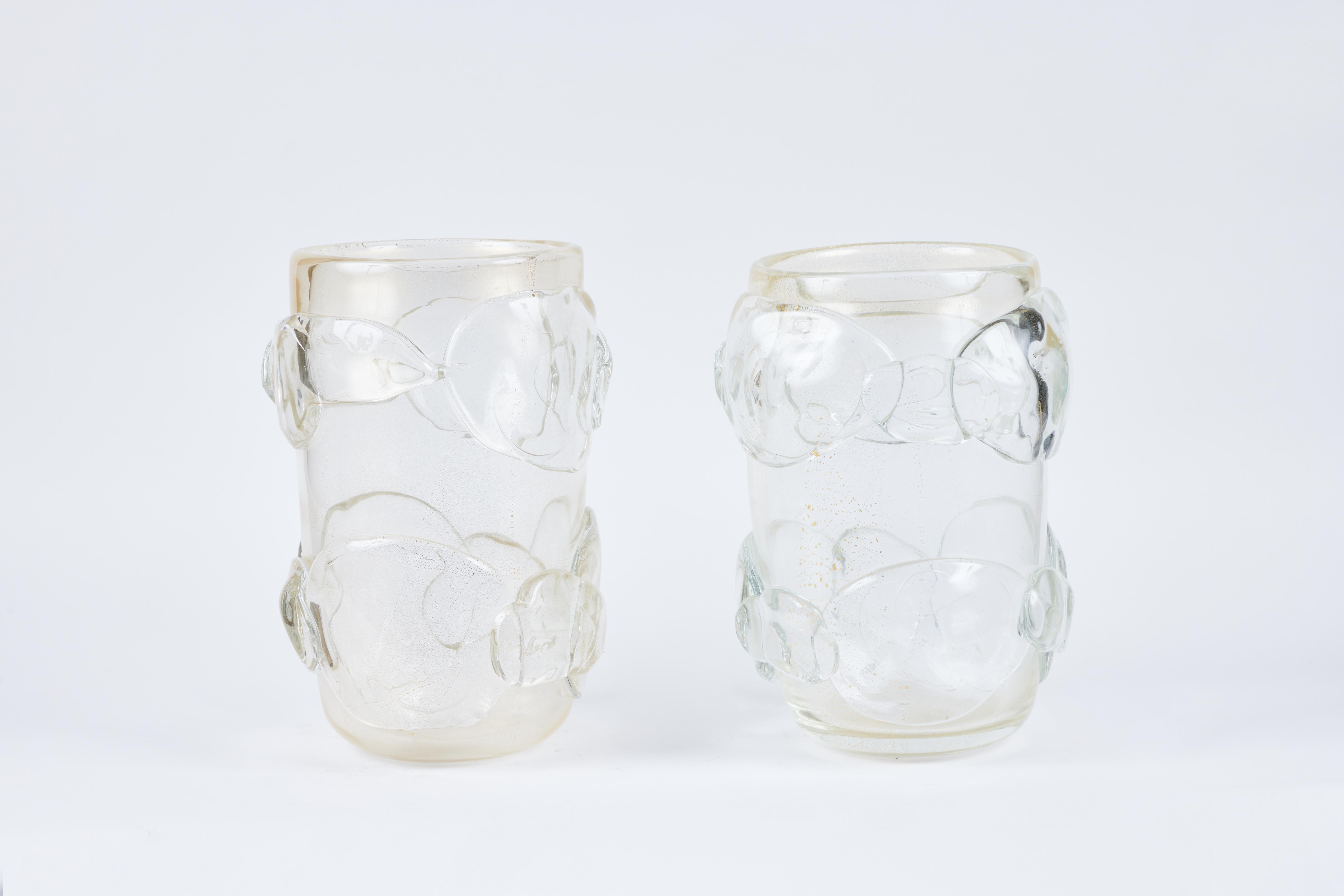 A pair of striking hand-blown glass flecked with 22 karat gold Murano vases. Can be sold separately.