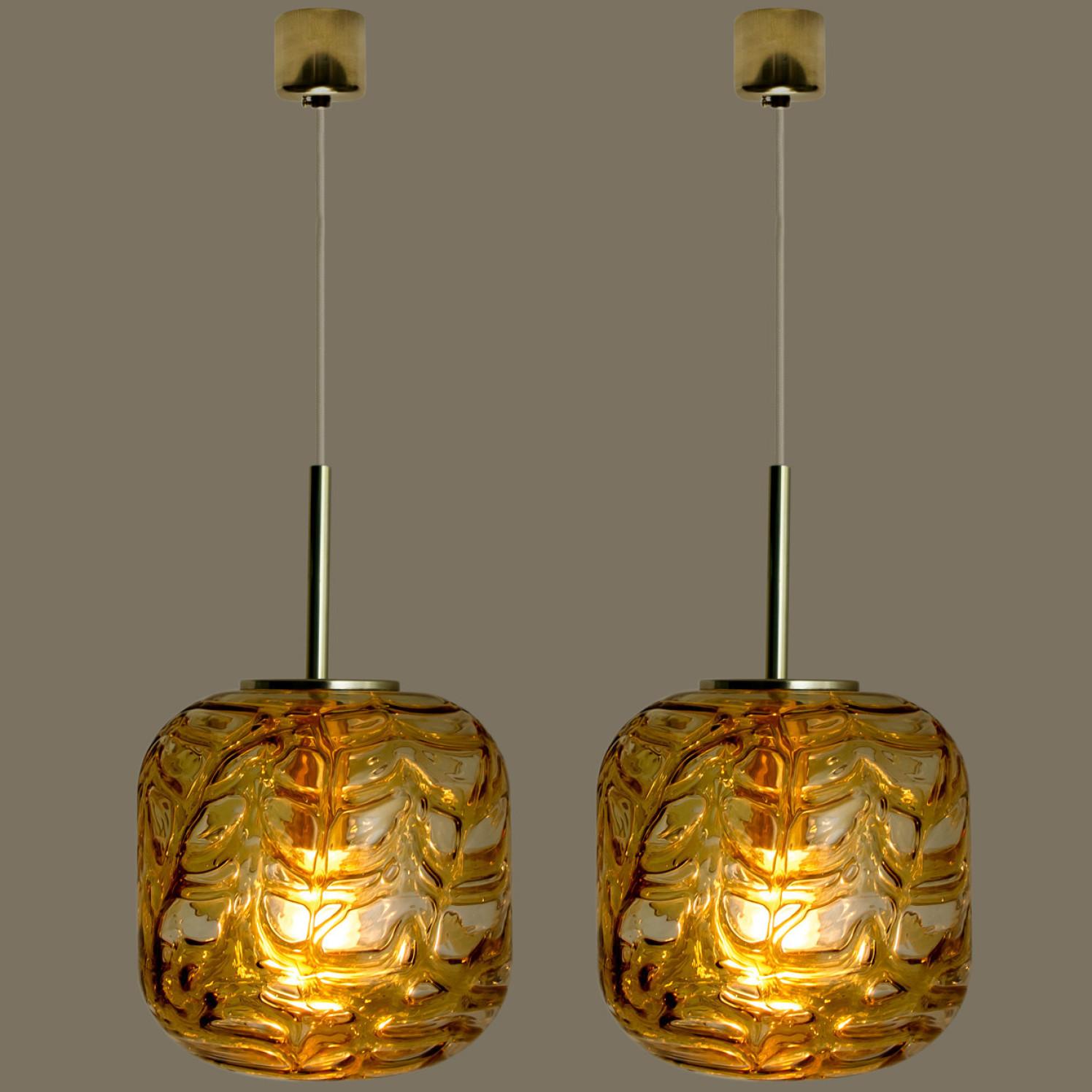 Mid-20th Century Pair of Murano Amber Clear Glass Doria Pendant Lights, 1960s