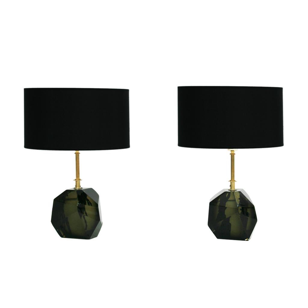 Pair of lamps made with translucent faceted green Murano glass original from the 1970s, brass structure and black chintz lampshades. Italy, 1970s.