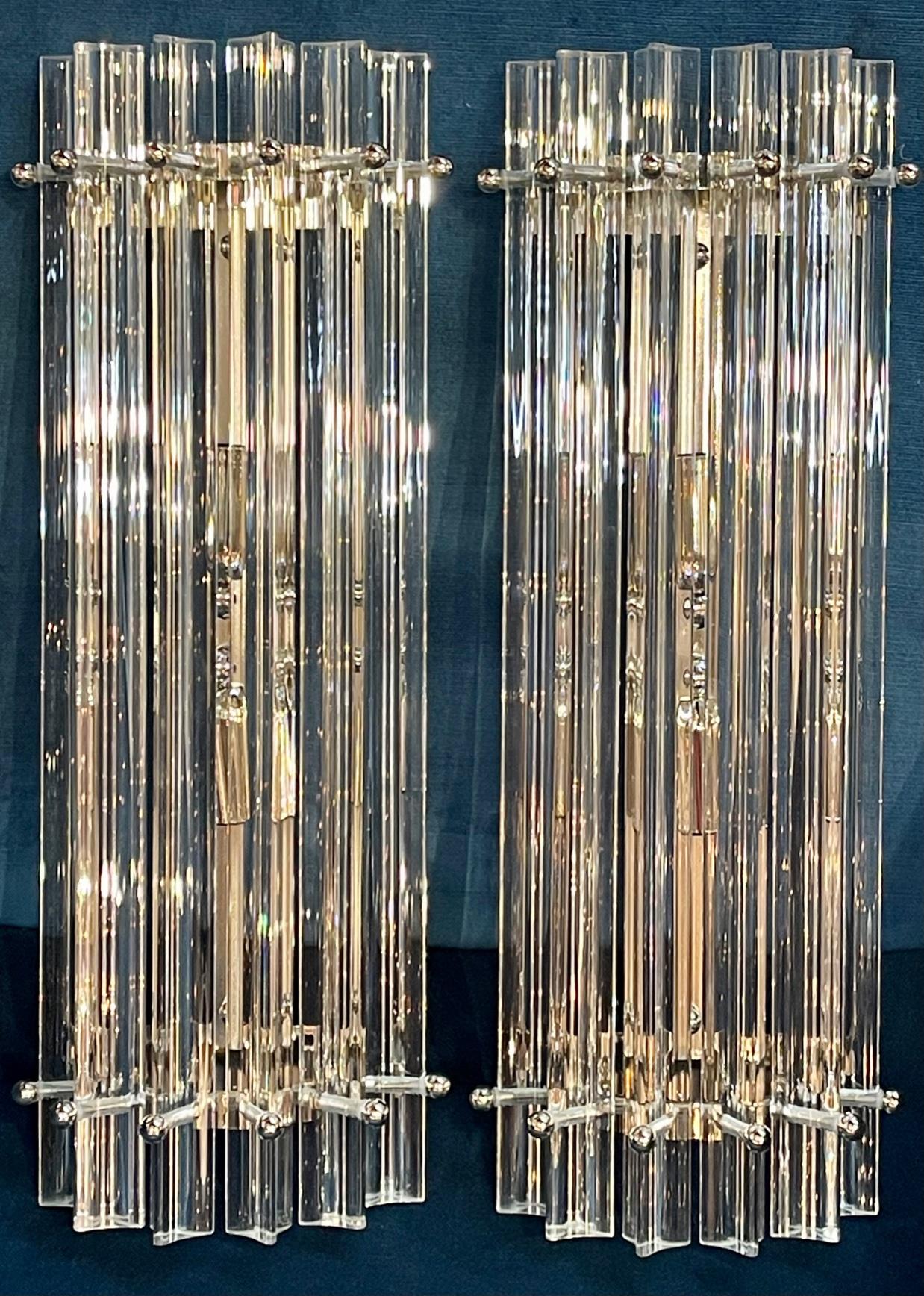 Pair of Murano glass and chrome barber style sconces. Circa 2000. The sconces are wired and ready to hang. Perfect for today's transitional designs!
