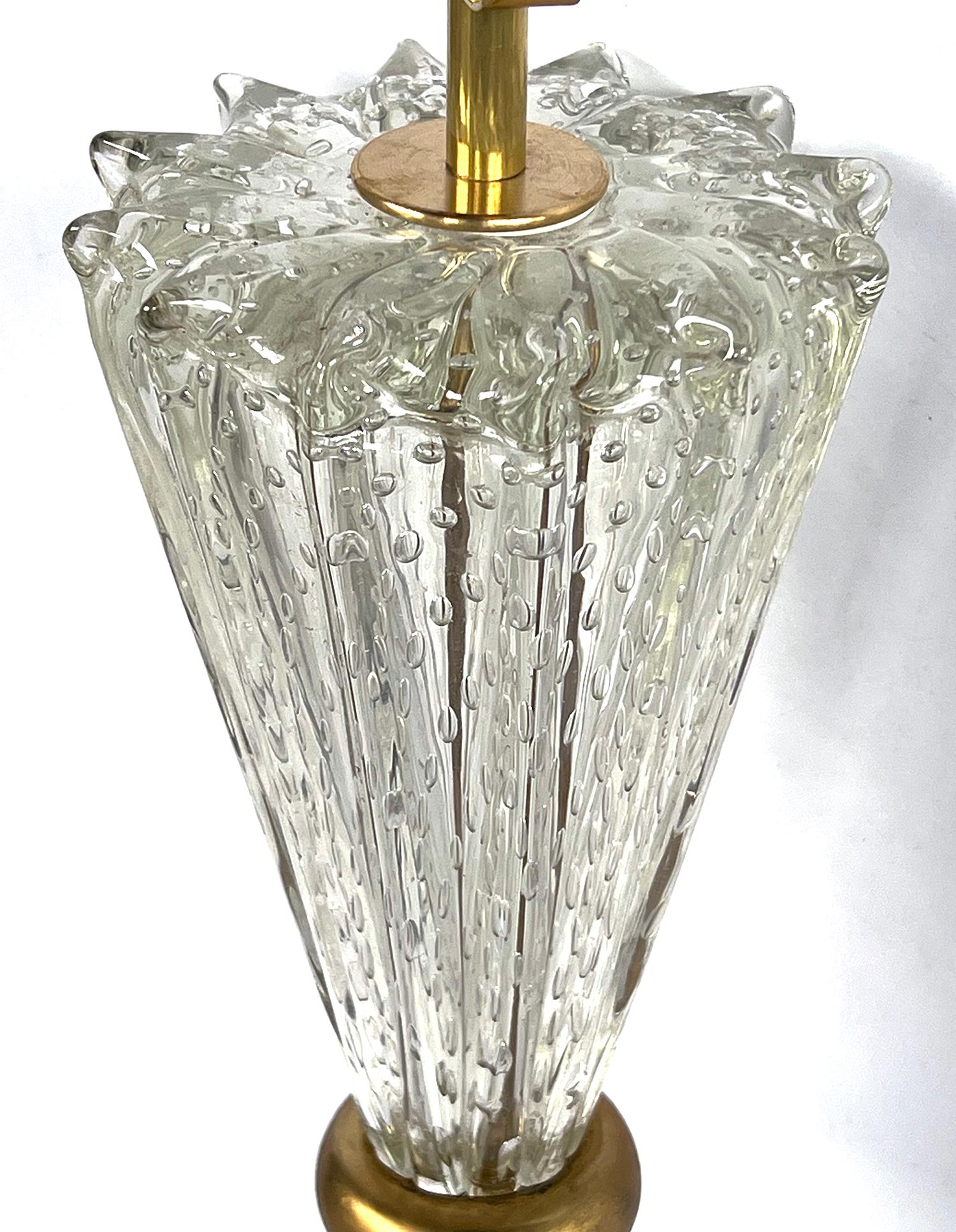 A rare pair of Barovier & Toso 1960s lamps composed of 2 clear bullicante (controlled bubble) conical form glass elements forming a pinched mid-section with gilt-metal ring.