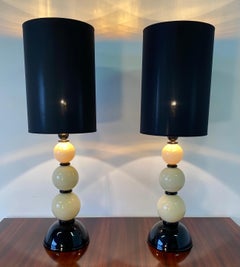 Coppia di lampade da tavolo in vetro nero e avorio di Murano