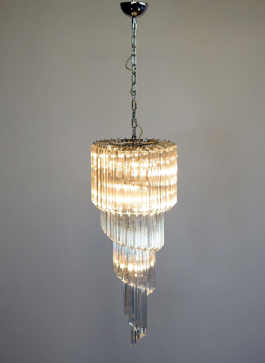 Fantastic pair of Murano chandeliers by 86 Murano crystal transparent prism in a nickel metal frame. The shape of this chandelier is spiral.
Period: late 20th century
Dimensions: 63 inches height (160 cm) with chain; 39,40 inches height (100 cm)