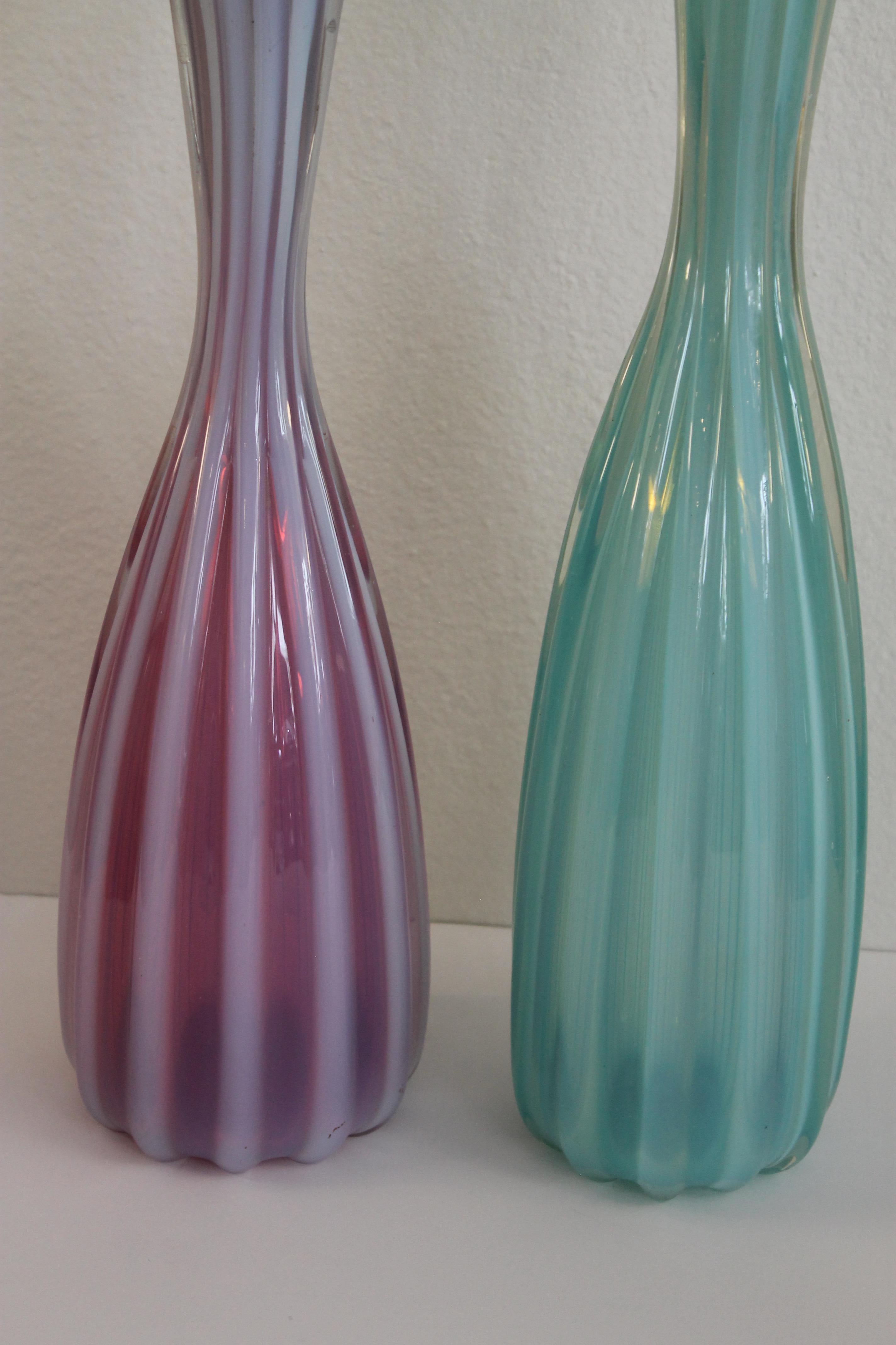 Pair of Italian Murano vases with cranberry, turquoise and opaque colors. The smaller (cranberry/opaque) vase measures 17.75