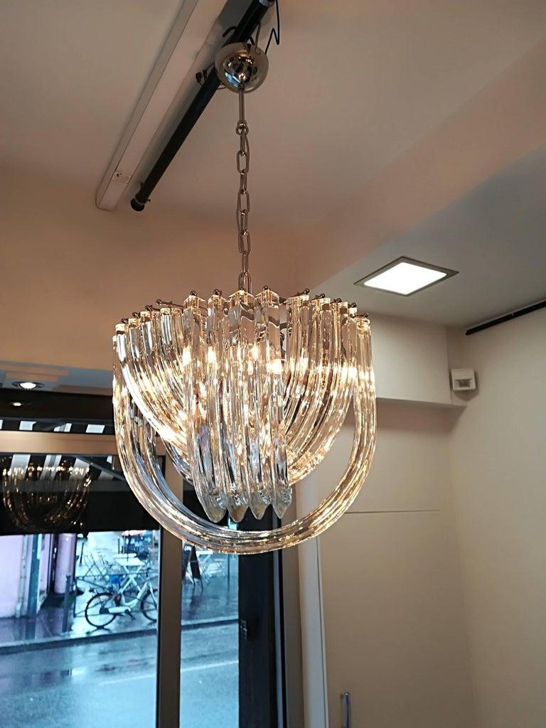 Murano hand blown clear crystal glass chandelier.
(x2 pieces)
Fixture in plated chrome.
Measures: Diameter 40 cm
4 bulbs
Height (38 cm) is only for the basket.
Total height 110cm can be reduced or increased.
Can be sold separately.