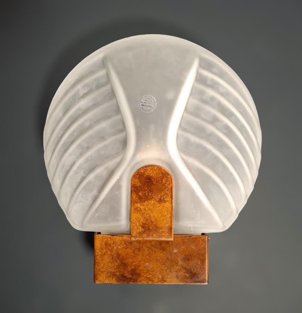 Vintage Italian wall lights with fan shaped satin frosted white Murano glass shades mounted on bronze metal frames / made in Italy, circa 1960s
Measures: height 13 inches, width 11 inches, depth 3.5 inches
1 light / E26 or E27 type / max 60W
1 pair