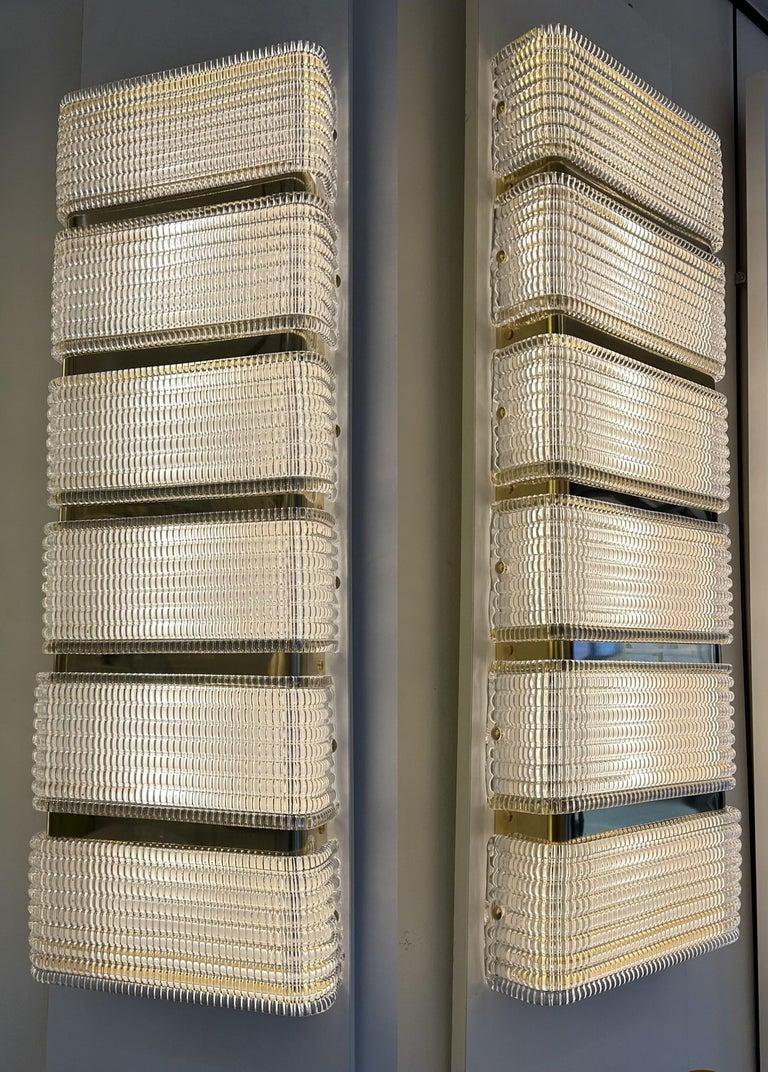 Pareja de apliques de cristal de Murano y latón
5 bombillas E27 totalmente compatibles con la norma E26 de EE.UU. (regulables)