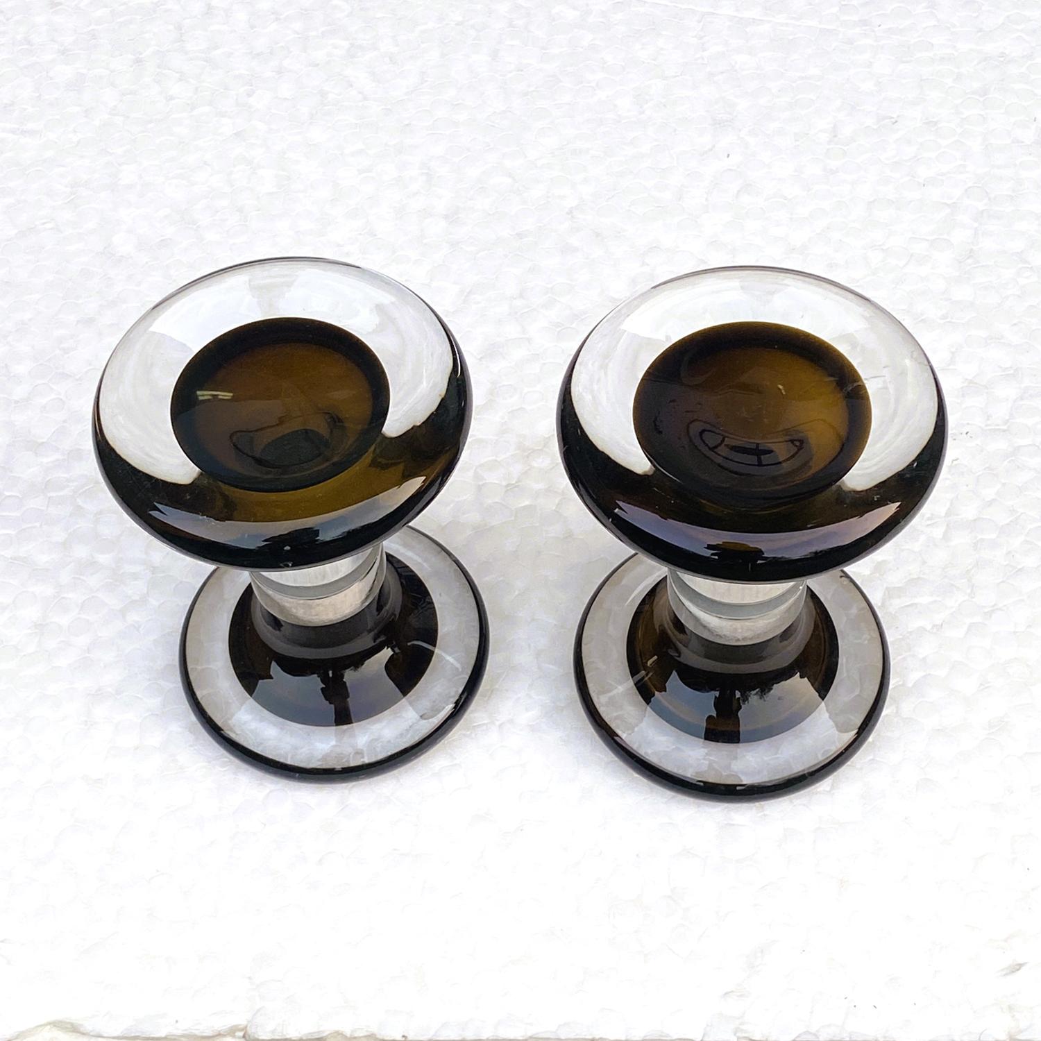 Pair of Seguso Vetri d`Arte double door handles in solid glass hand blown Sommerso Murano glass with centre in chocolate brown and outer ring in clear glass fitted to a chrome sleeve.
Sommerso is an Italian glass technique used in producing the