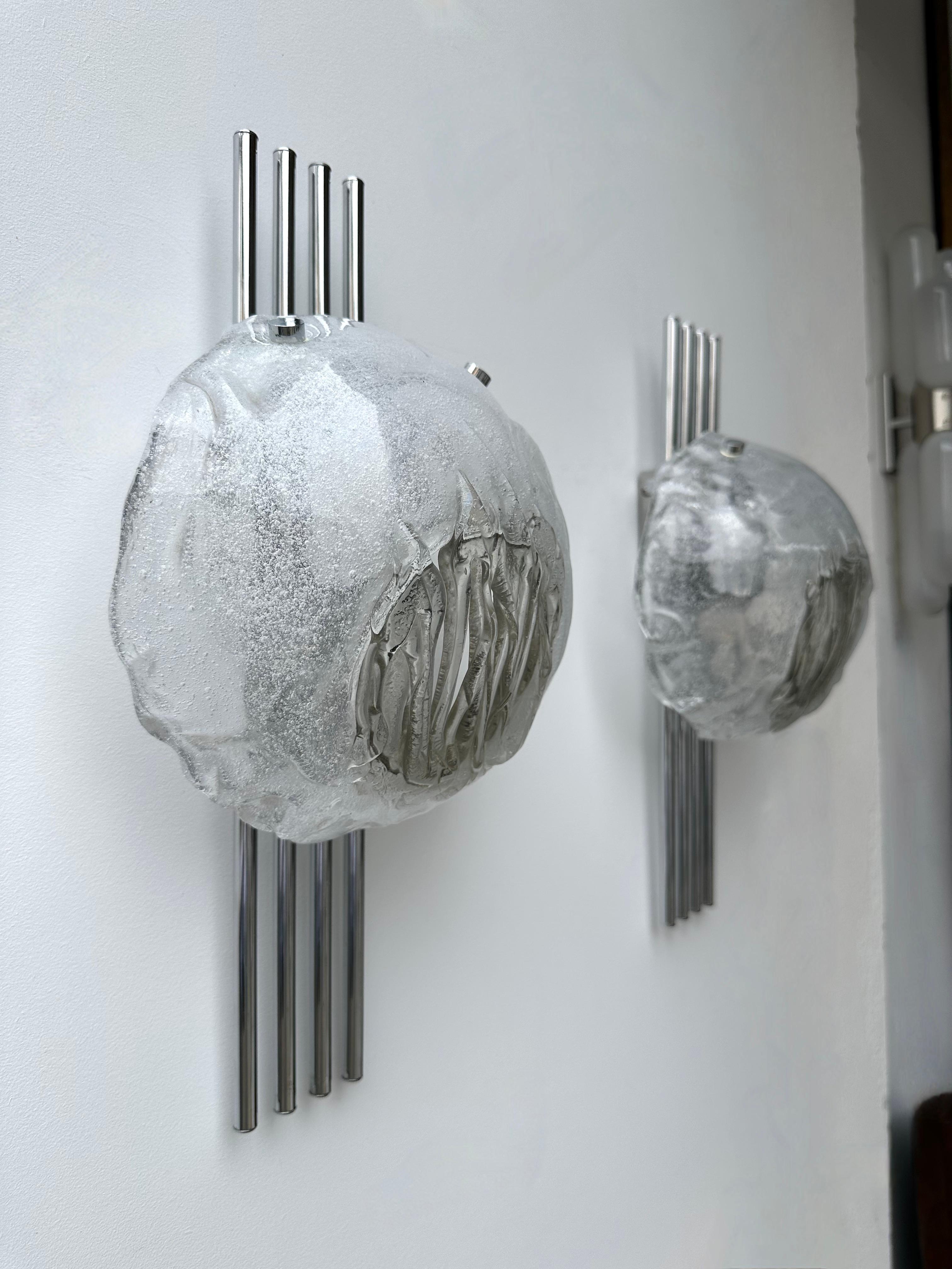 Pair of Space age Mid-Century Modern metal chrome and textured glass wall lights lamps sconces by the italian designer Angelo Brotto for the manufacture Esperia. Famous design Venini, La Murrina, Seguso, Carlo Aldo Nason, Poliarte, Stilnovo,