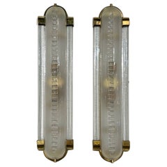 Pareja de "Apliques de Barbero" de cristal de Murano y latón pulido