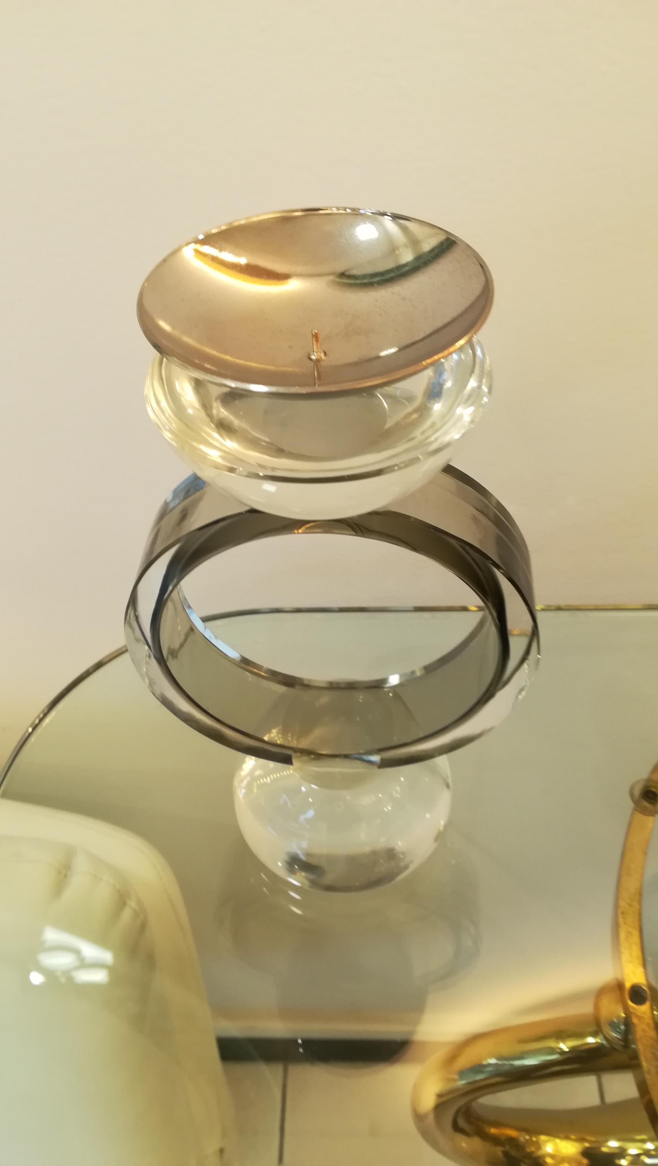 Pair of Murano glass candlesticks, transparent and light brown.
Top in chromium steel.