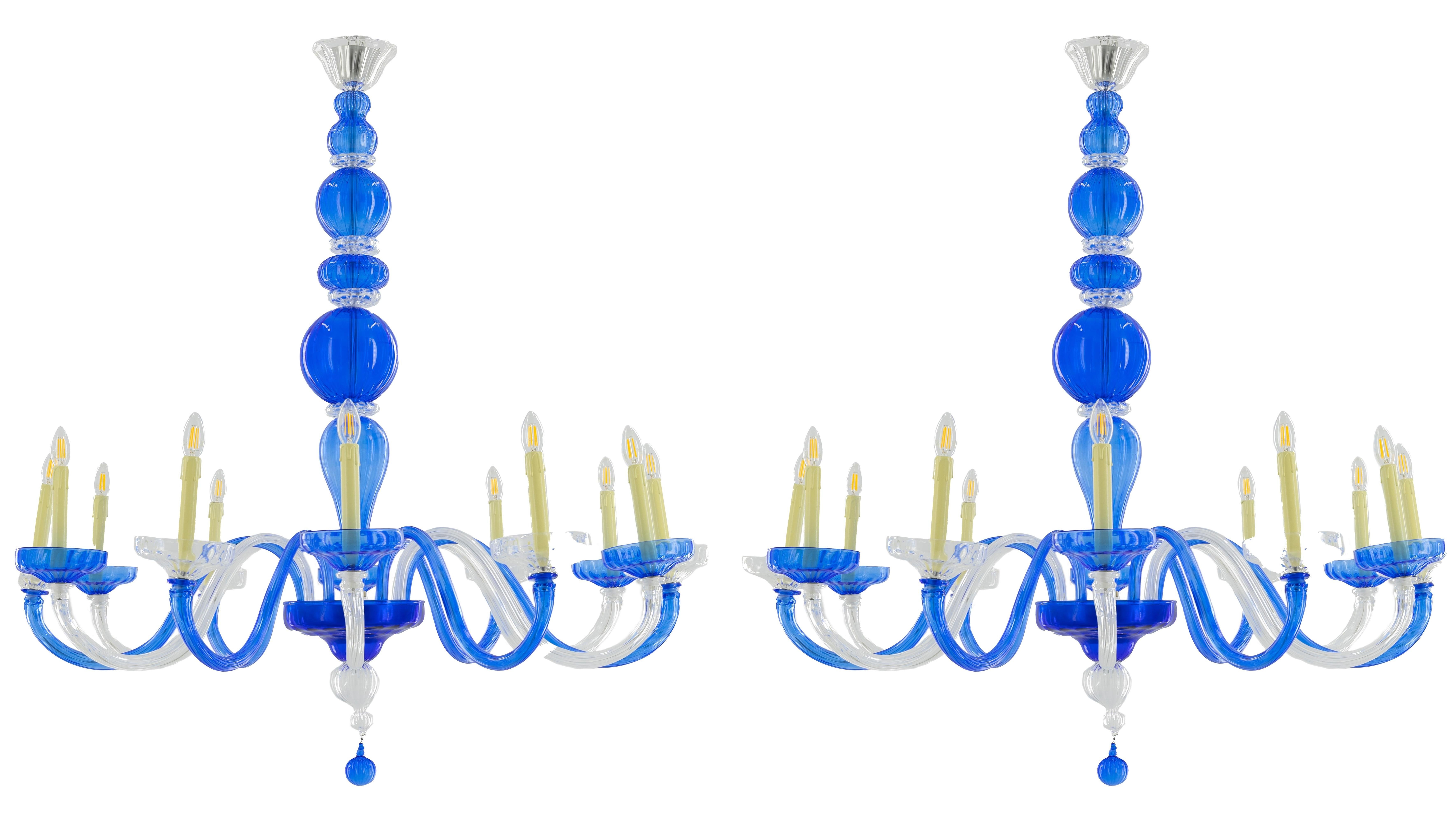 Pair of Ca' Bragadin Murano Glass Chandelier: Cobalt & Crystal, Hand-Formed Candlestick Design, Venetian Elegance

This Ca' Bragadin Murano glass chandelier presents a striking interpretation of classic Venetian design, rendered in a captivating