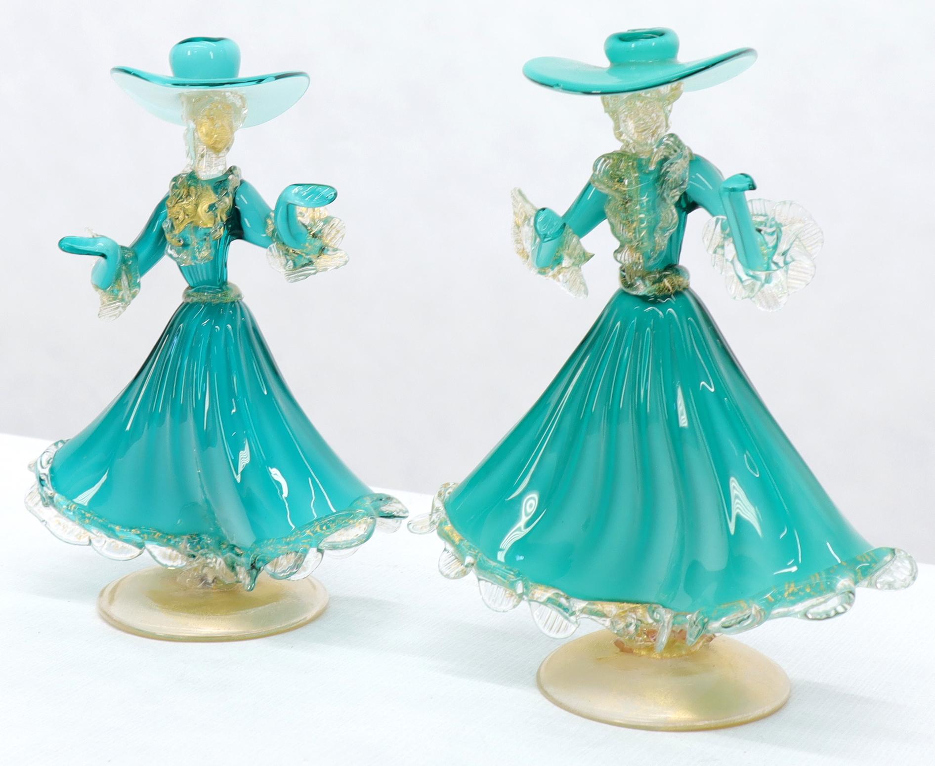 Pair of Murano glass green dresses dancing lady figurines.